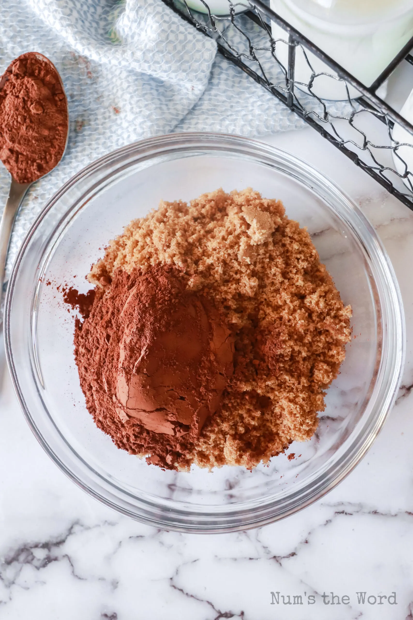 In a small bowl, brown sugar and more cocoa power ready to be mixed and sprinkled on top.