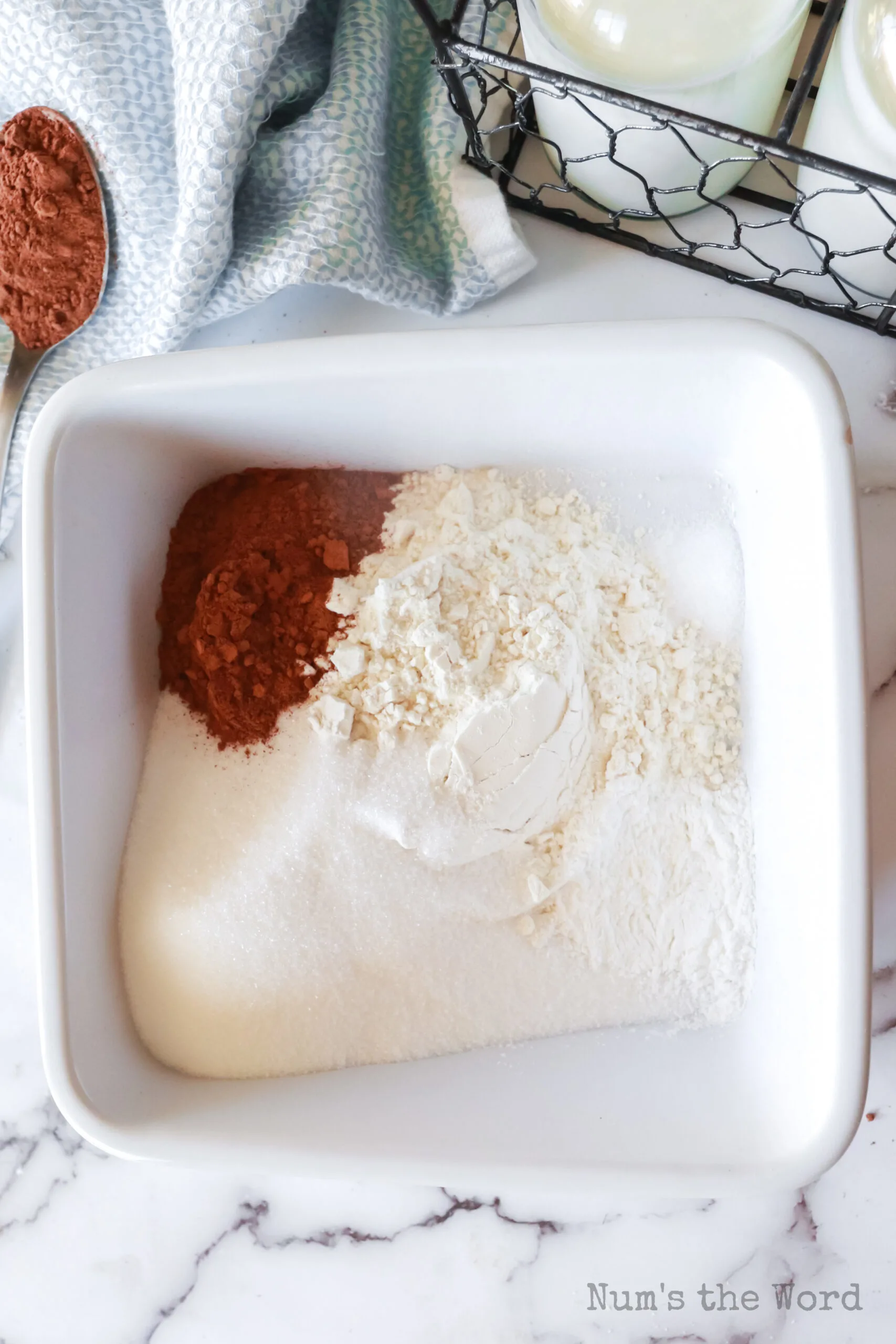 flour, sugar, cocoa powder, baking powder, and salt in a 9" ungreased casserole dish, unmixed.