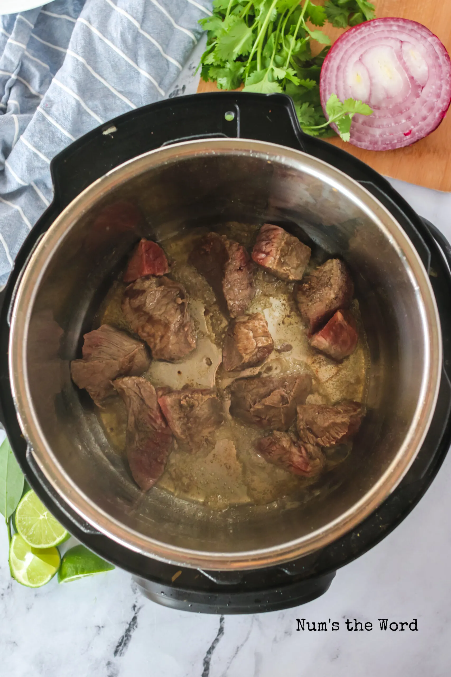 Stew beef chunks searing in instant pot