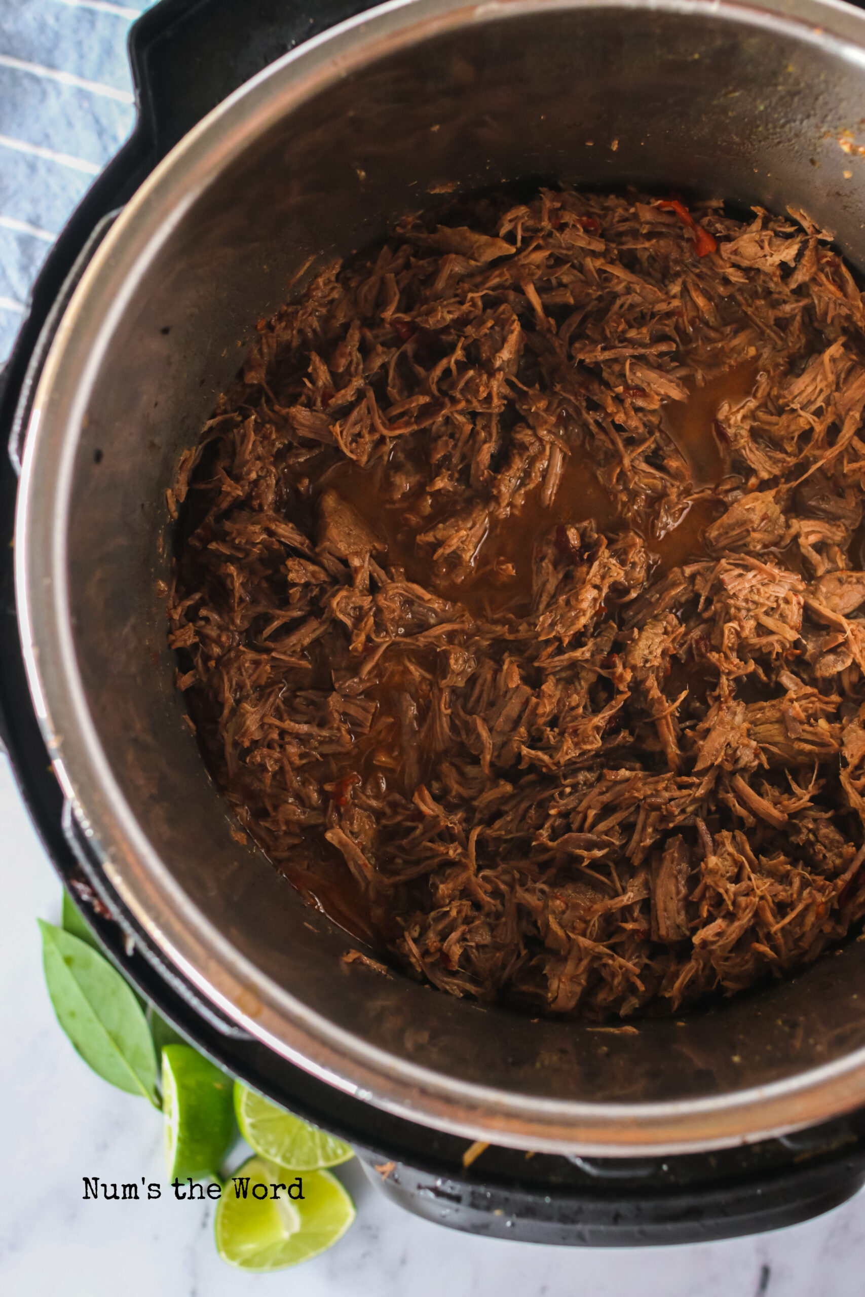 Cooked stew beef, shredded and turned into barbacoa beef.