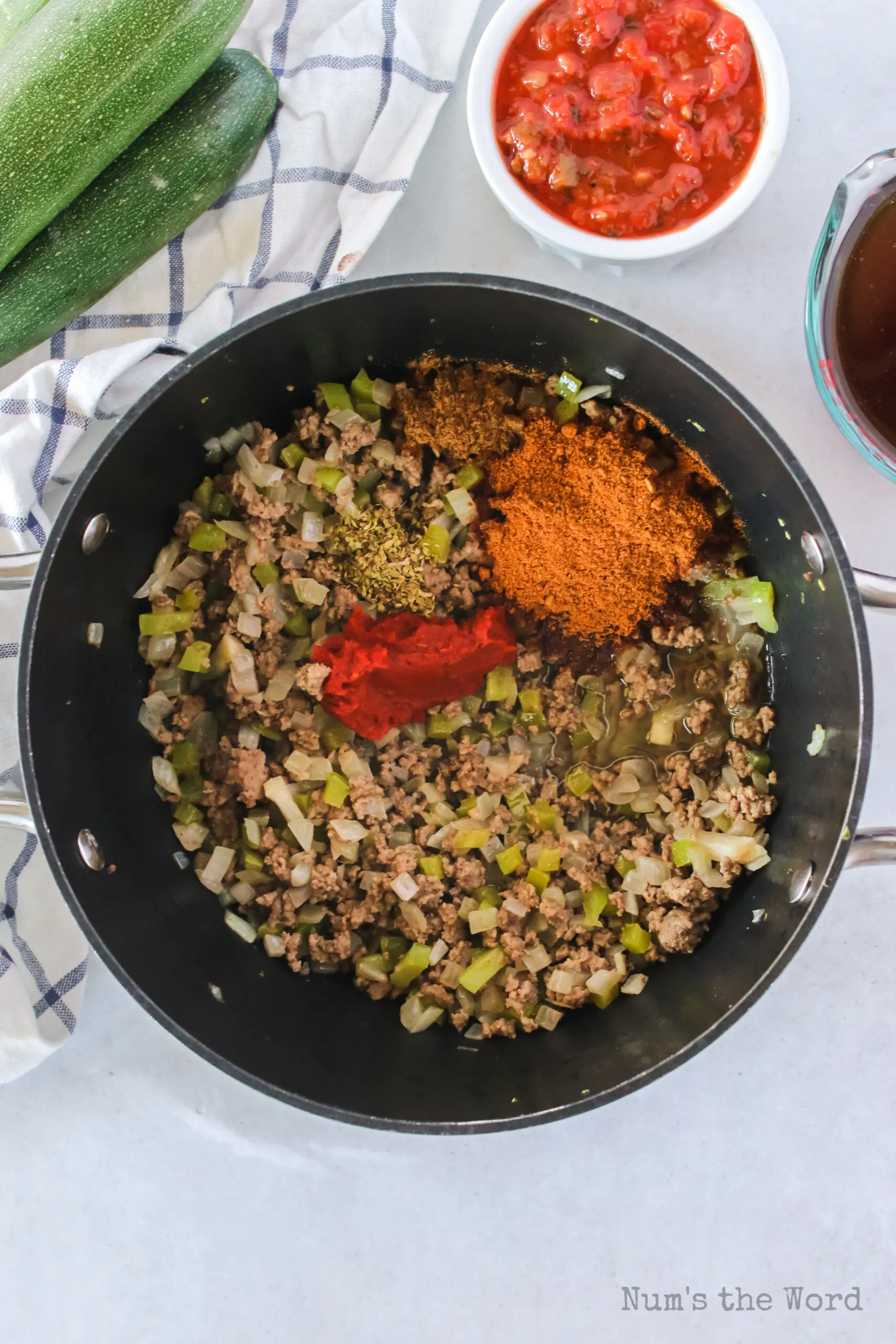 beef cooked taco seasoning, coriander, oregano and tomato paste added to cooked beef.