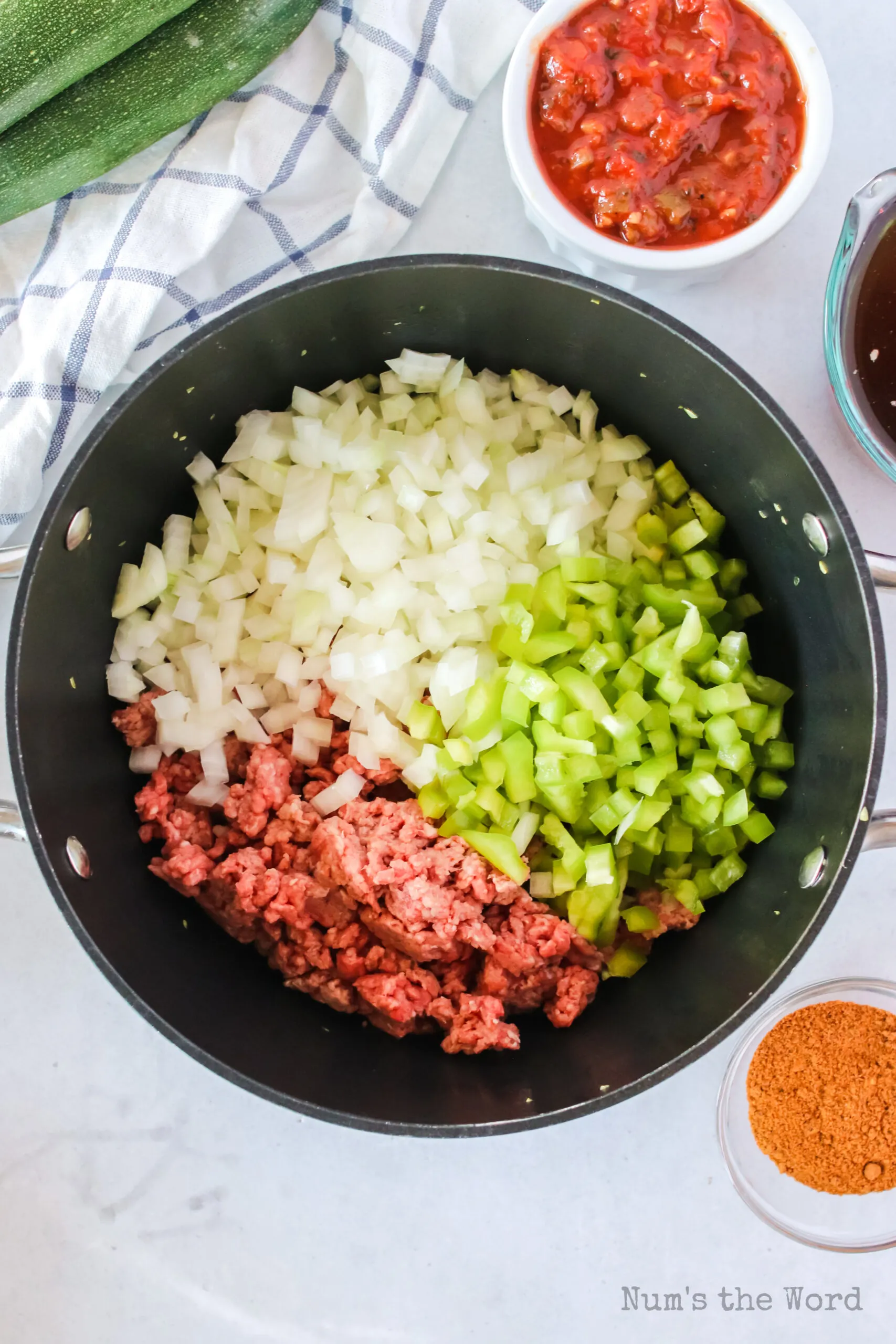 zucchini removed and ground beef, onion and bell pepper added to pot.