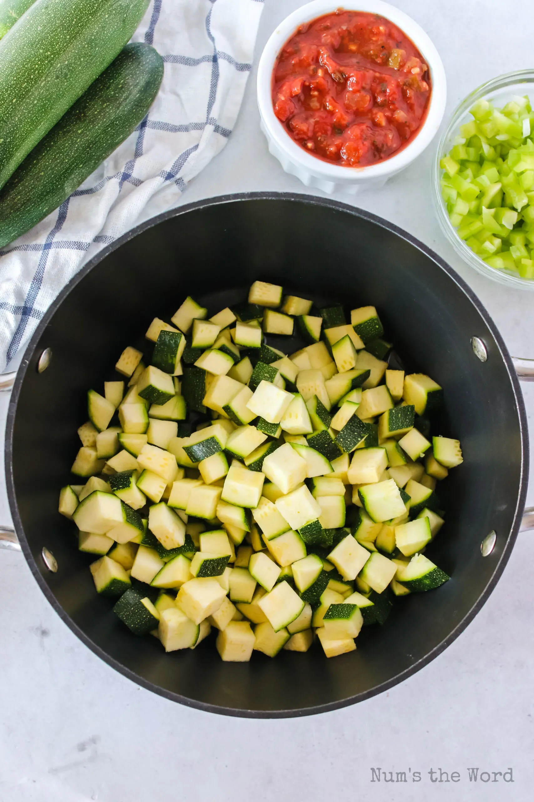 zucchini and oil in a pot