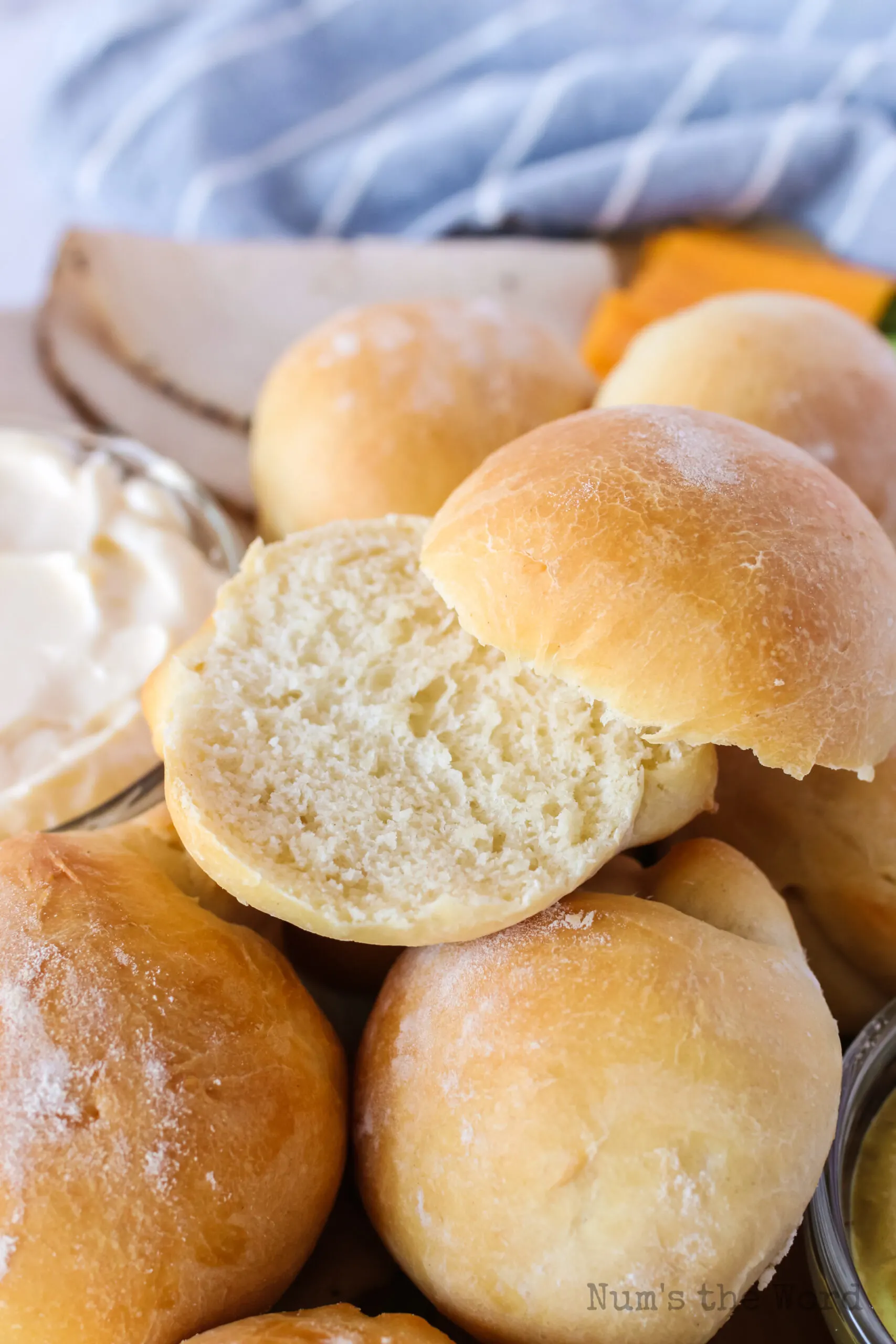 zoomed in image of rolls on a platter with one cut in half.