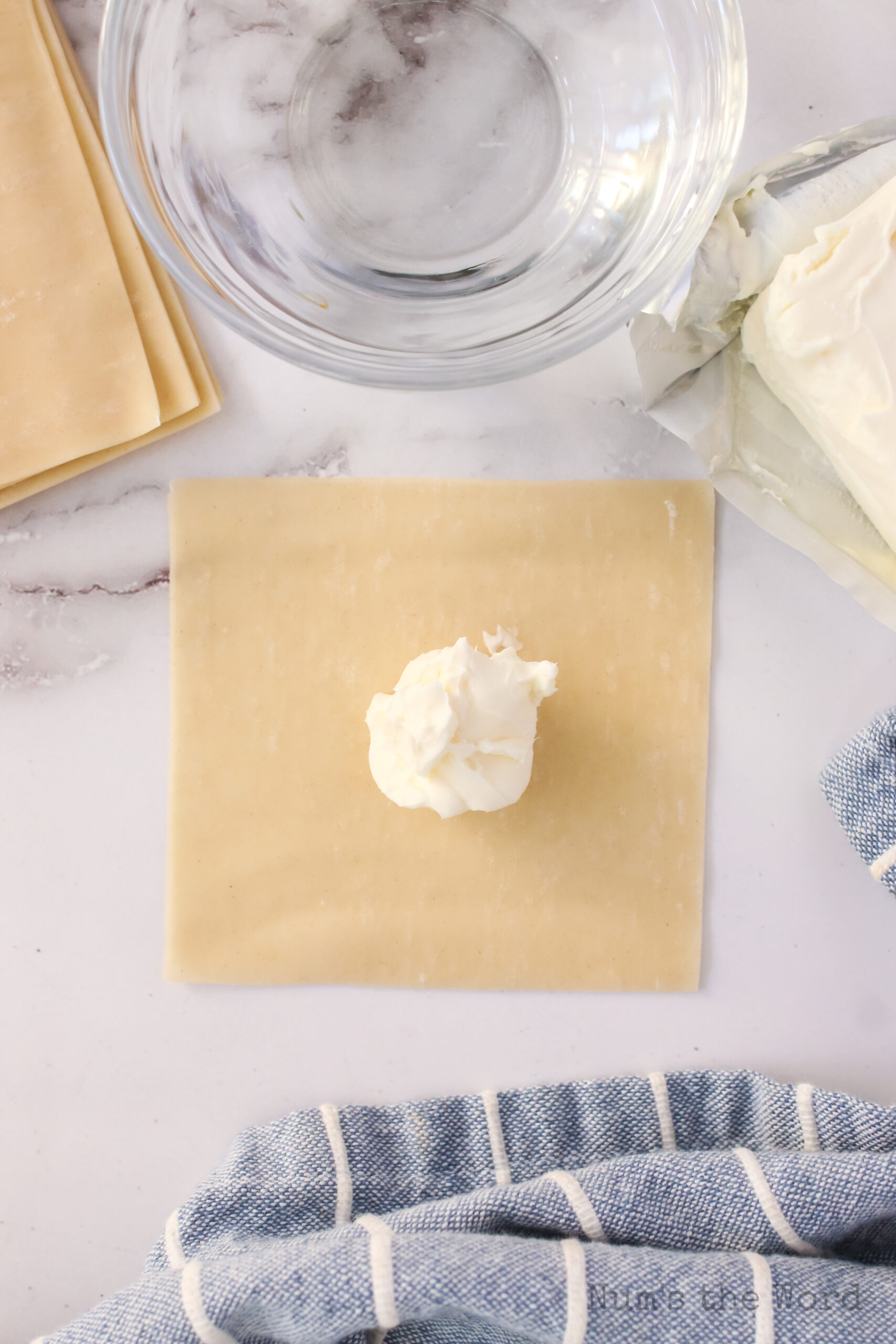 cream cheese dollop on a wonton wrapper