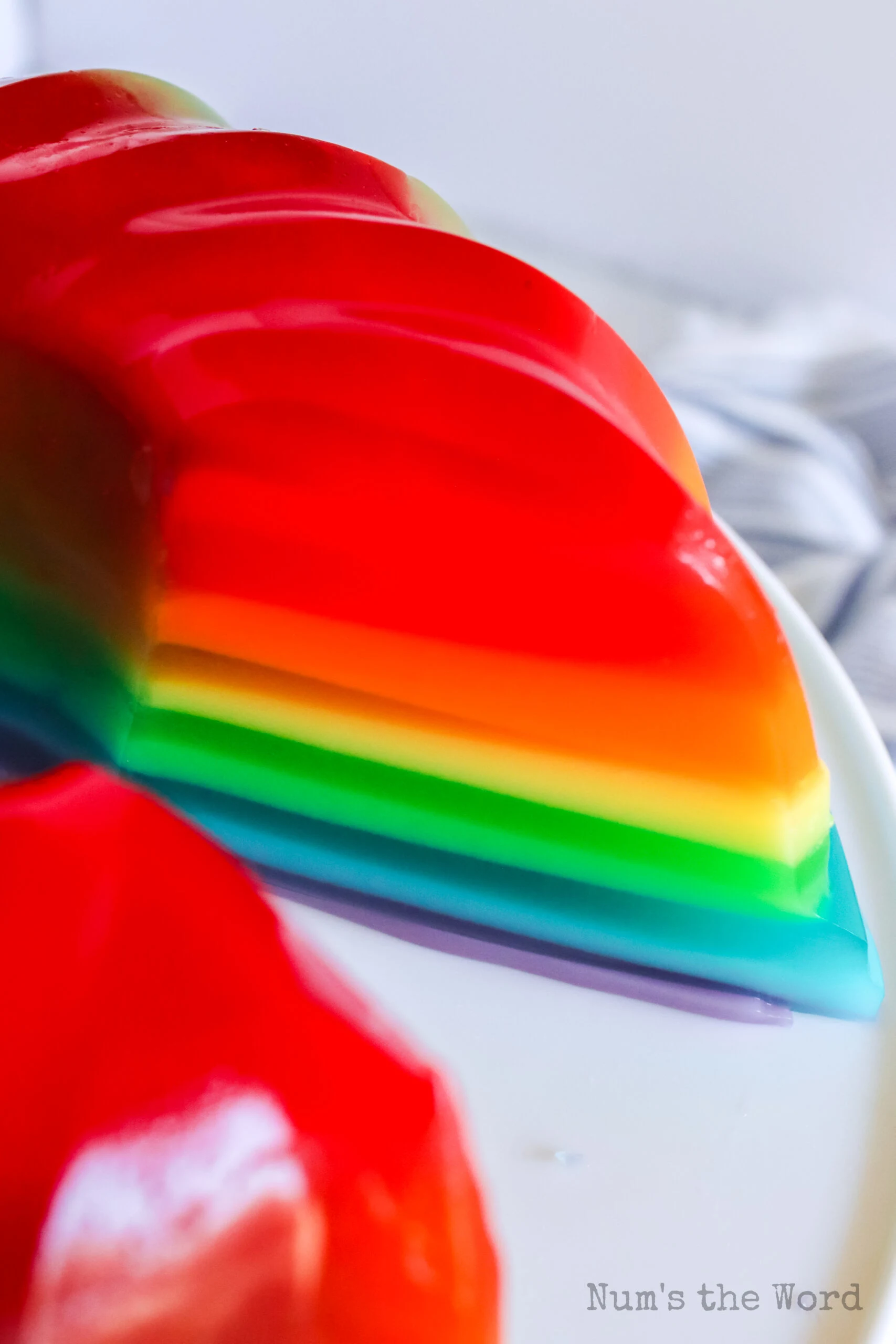 a large slice removed from jello to show layers.