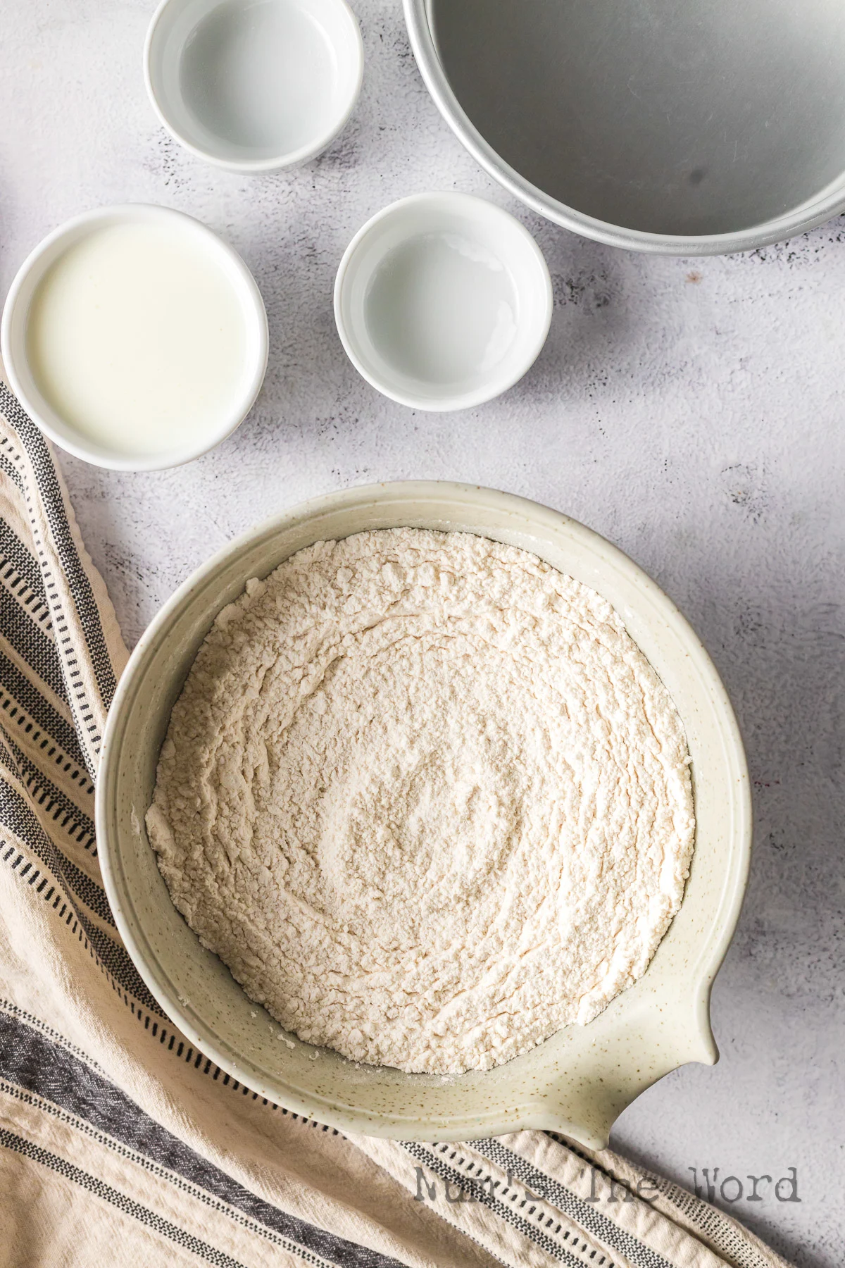 flour, baking soda and salt mixed in a bowl.