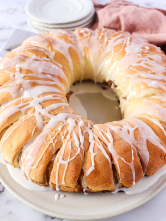 side view of swedish tea ring with icing