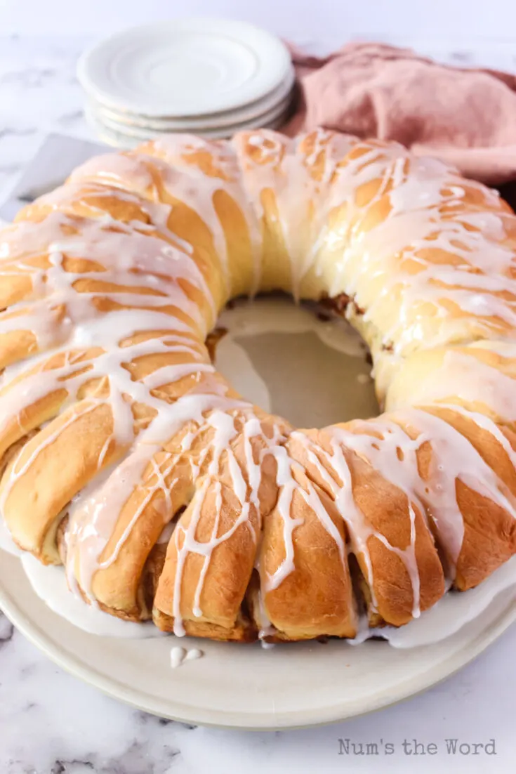 side view of swedish tea ring with icing