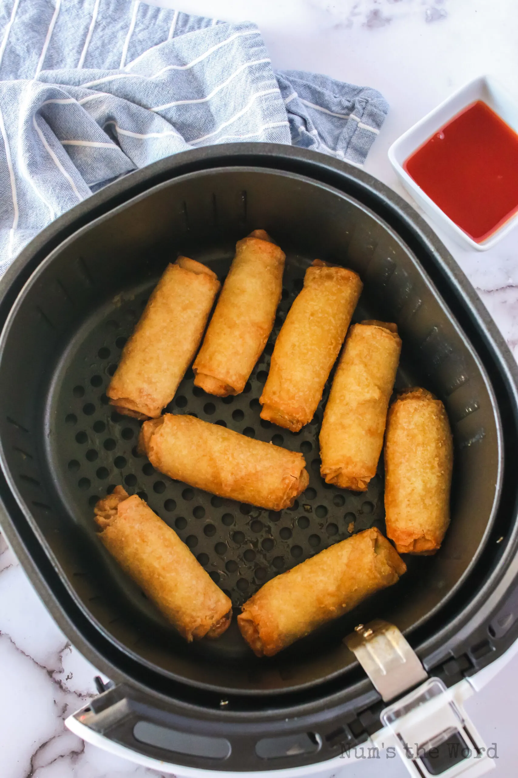 cooked egg rolls in air fryer basket