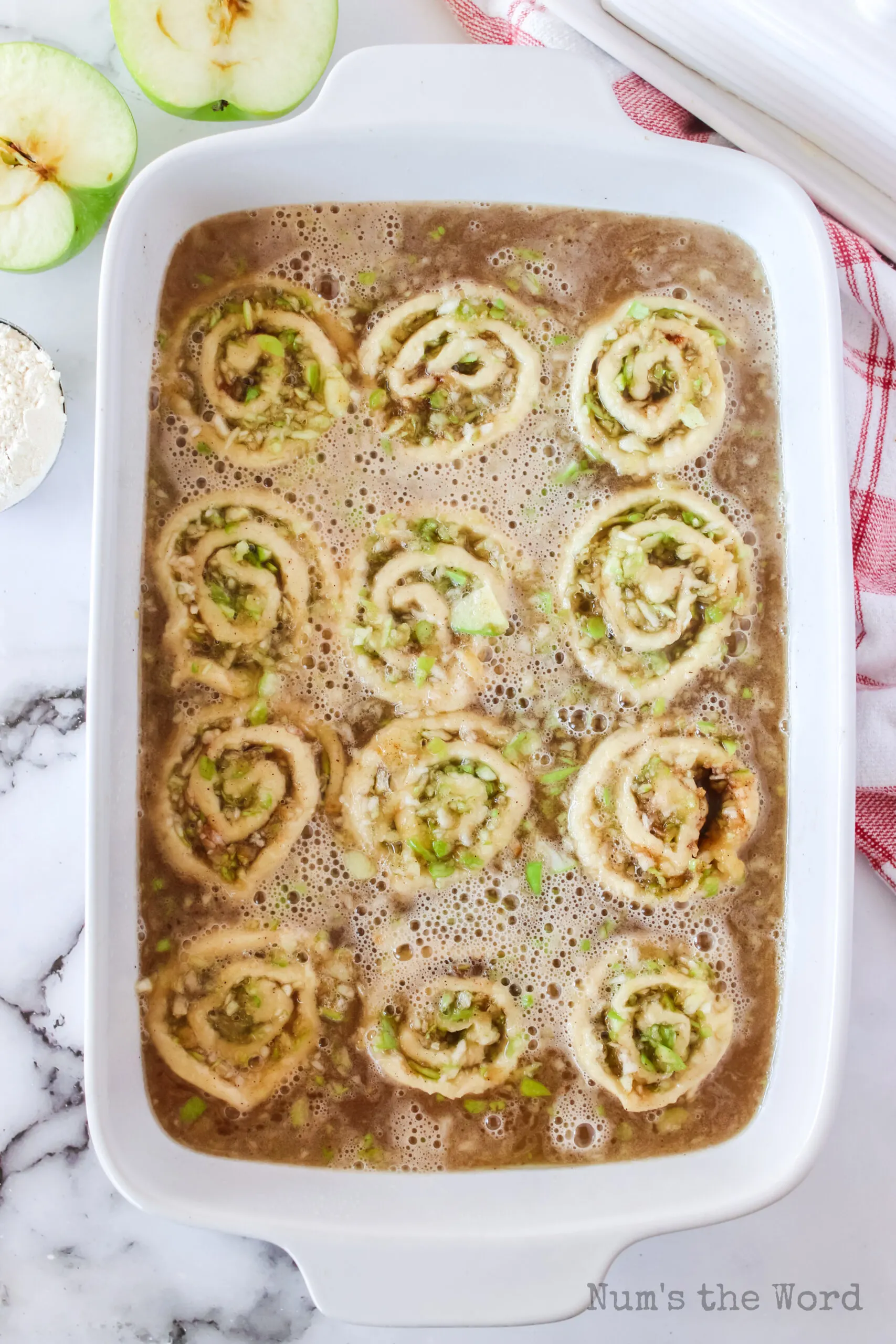 caramel sauce poured over apple dumplings