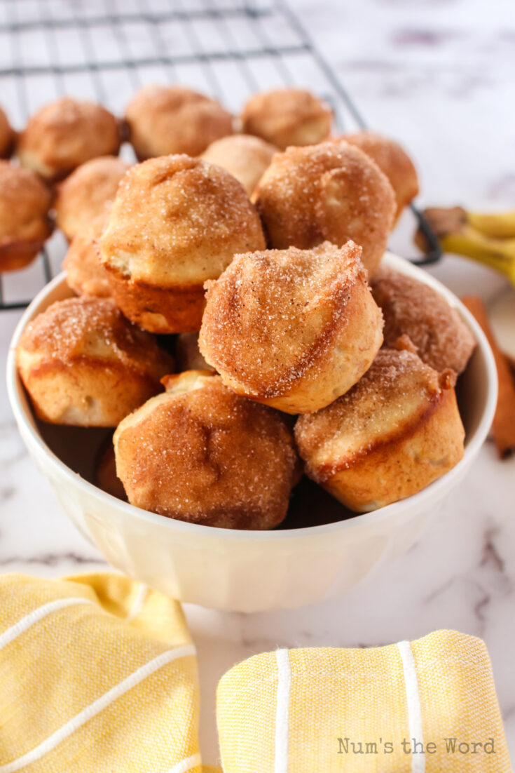 side view of muffins in a bowl.