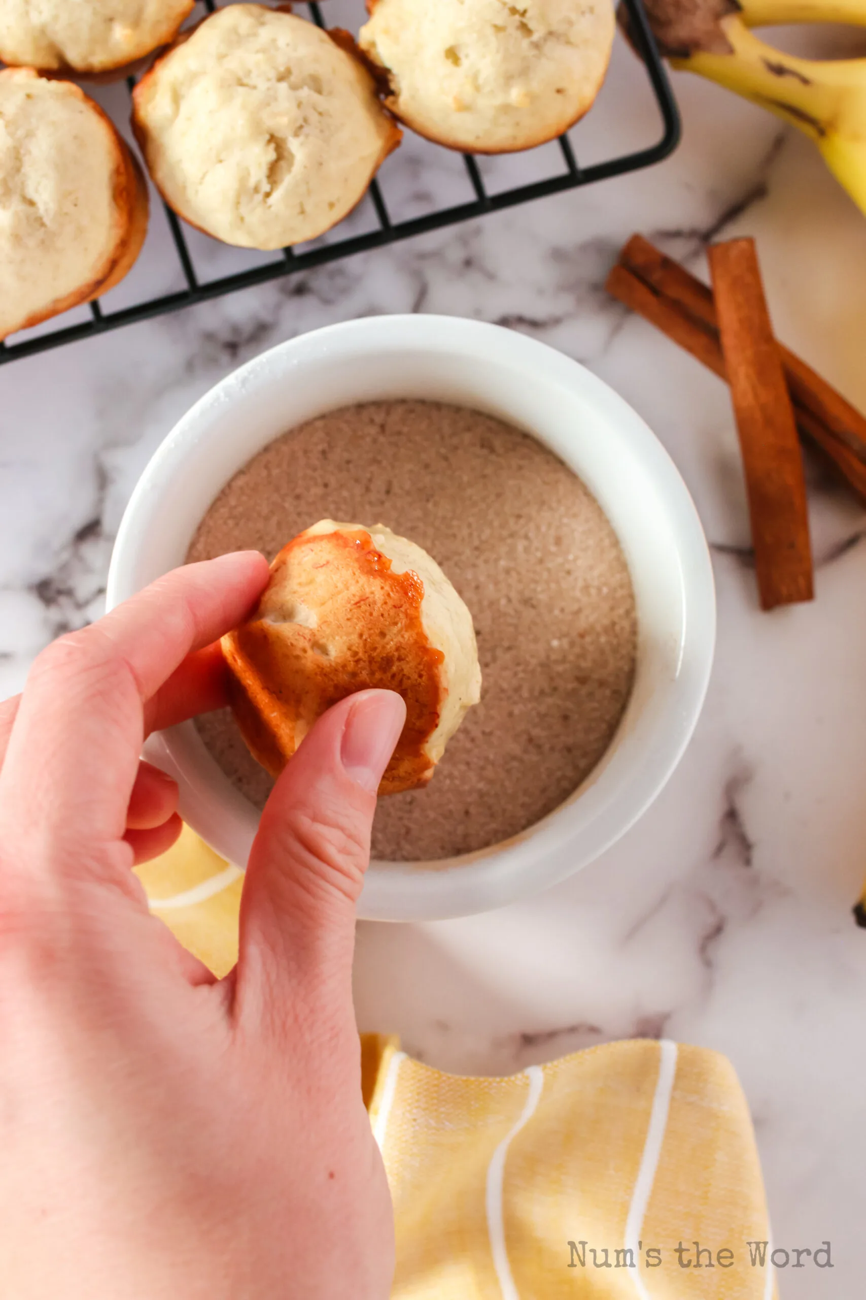 buttered muffin top dipped in cinnamon sugar mixture.