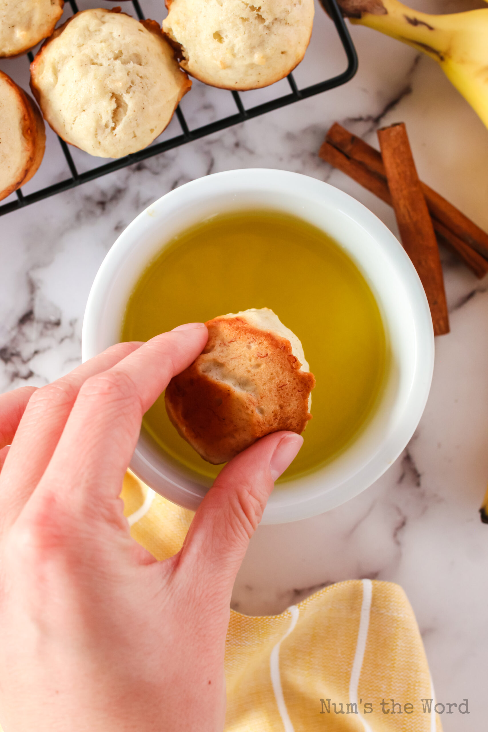 tops of the muffins dipped into butter