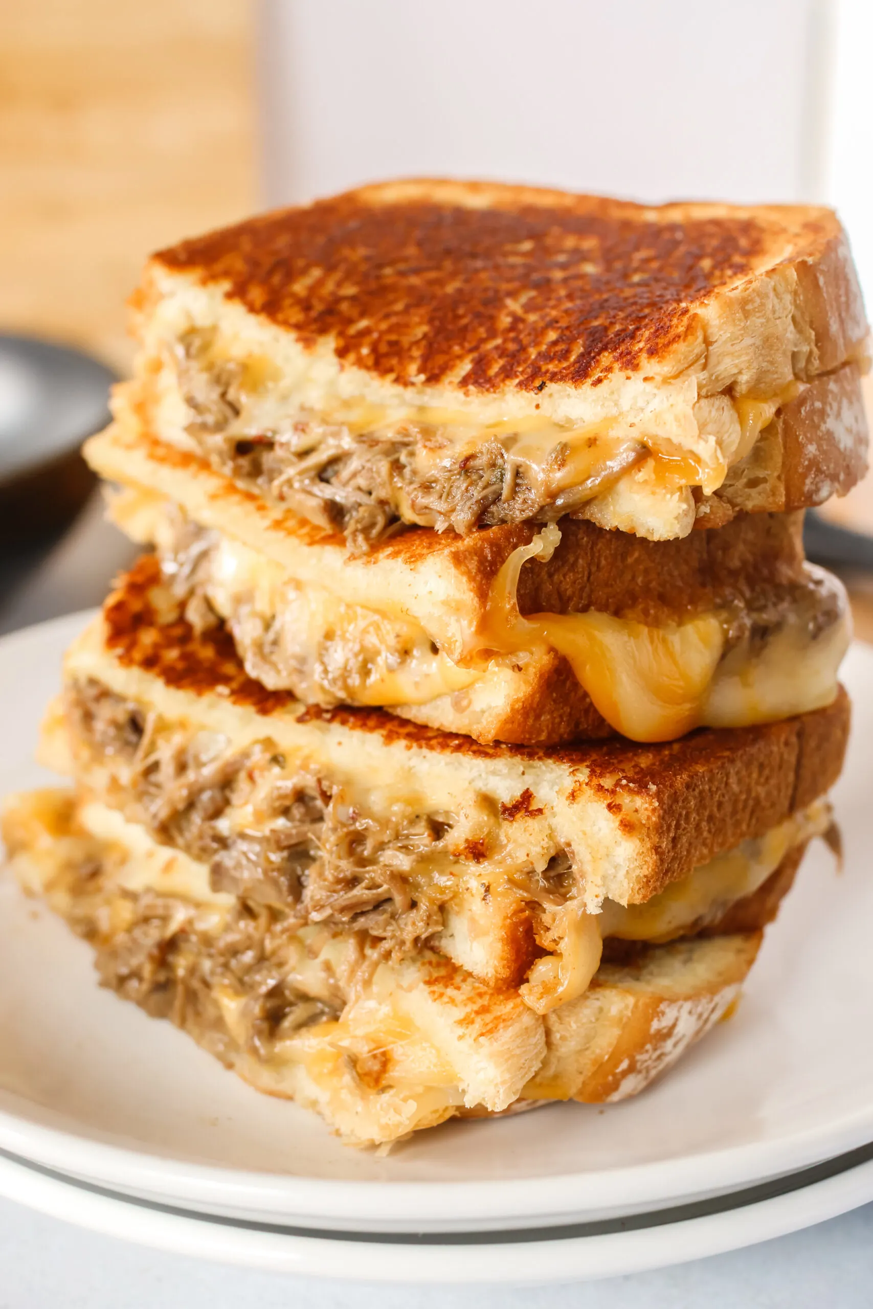 side view of grilled cheese stacked on top of each other