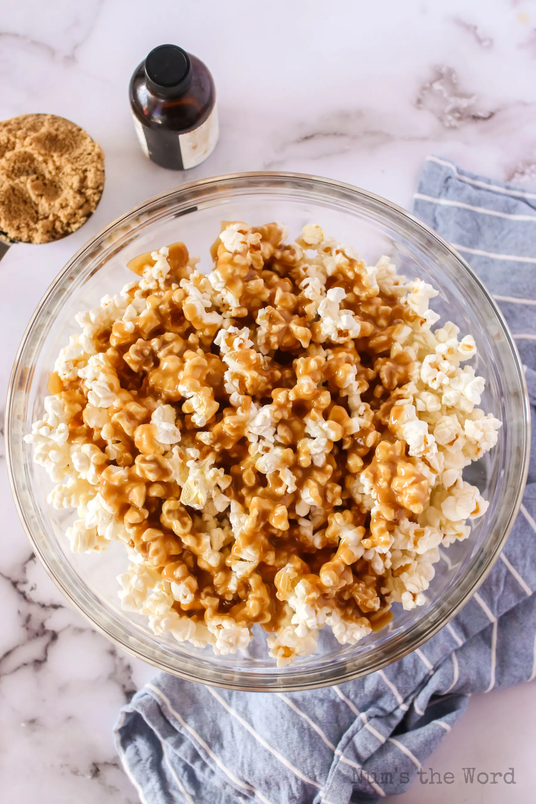 caramel sauce poured over popcorn