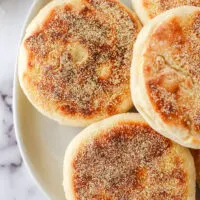 zoomed in image of english muffins on a plate