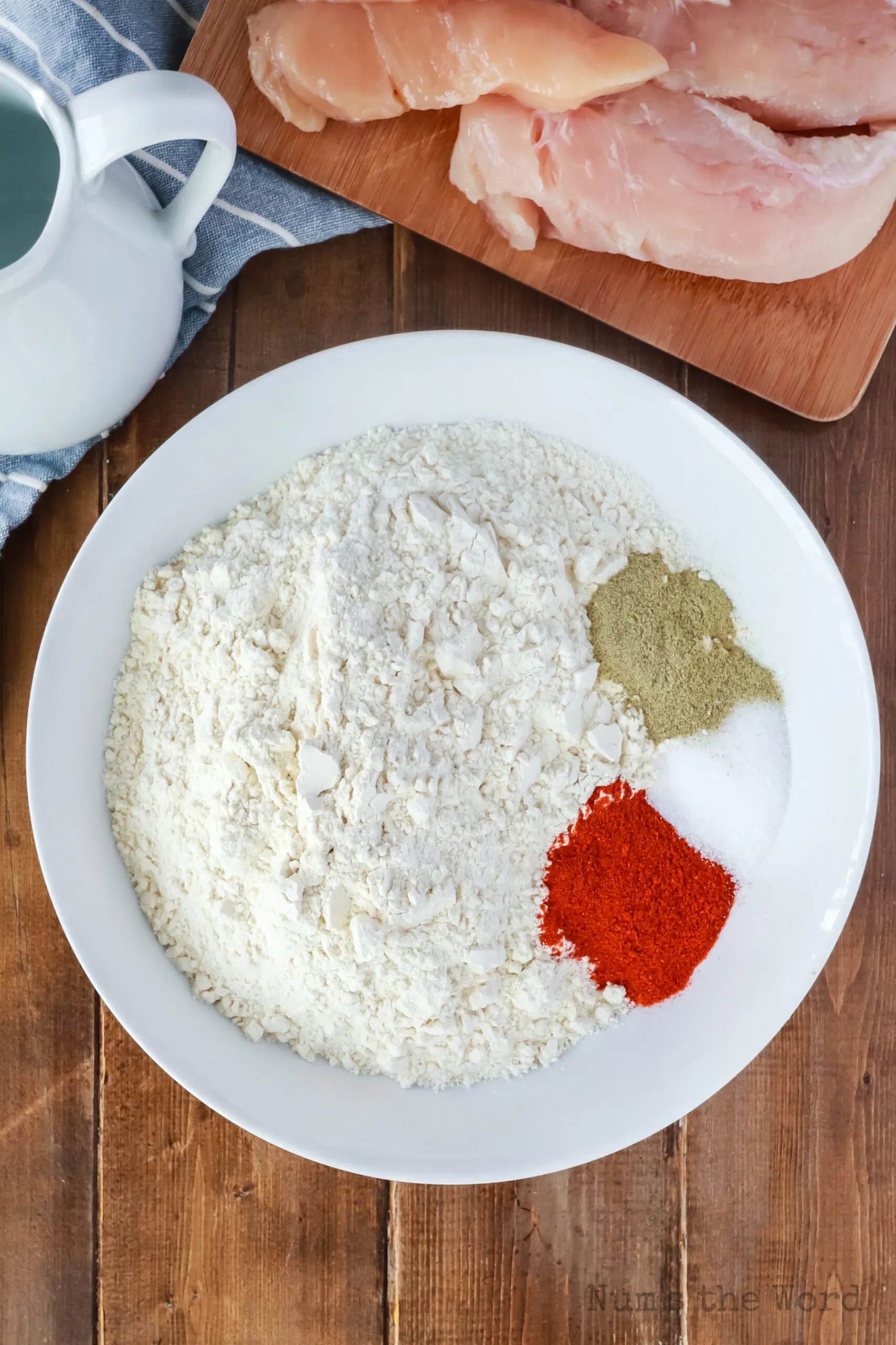 seasoning in flour in a bowl, unmixed