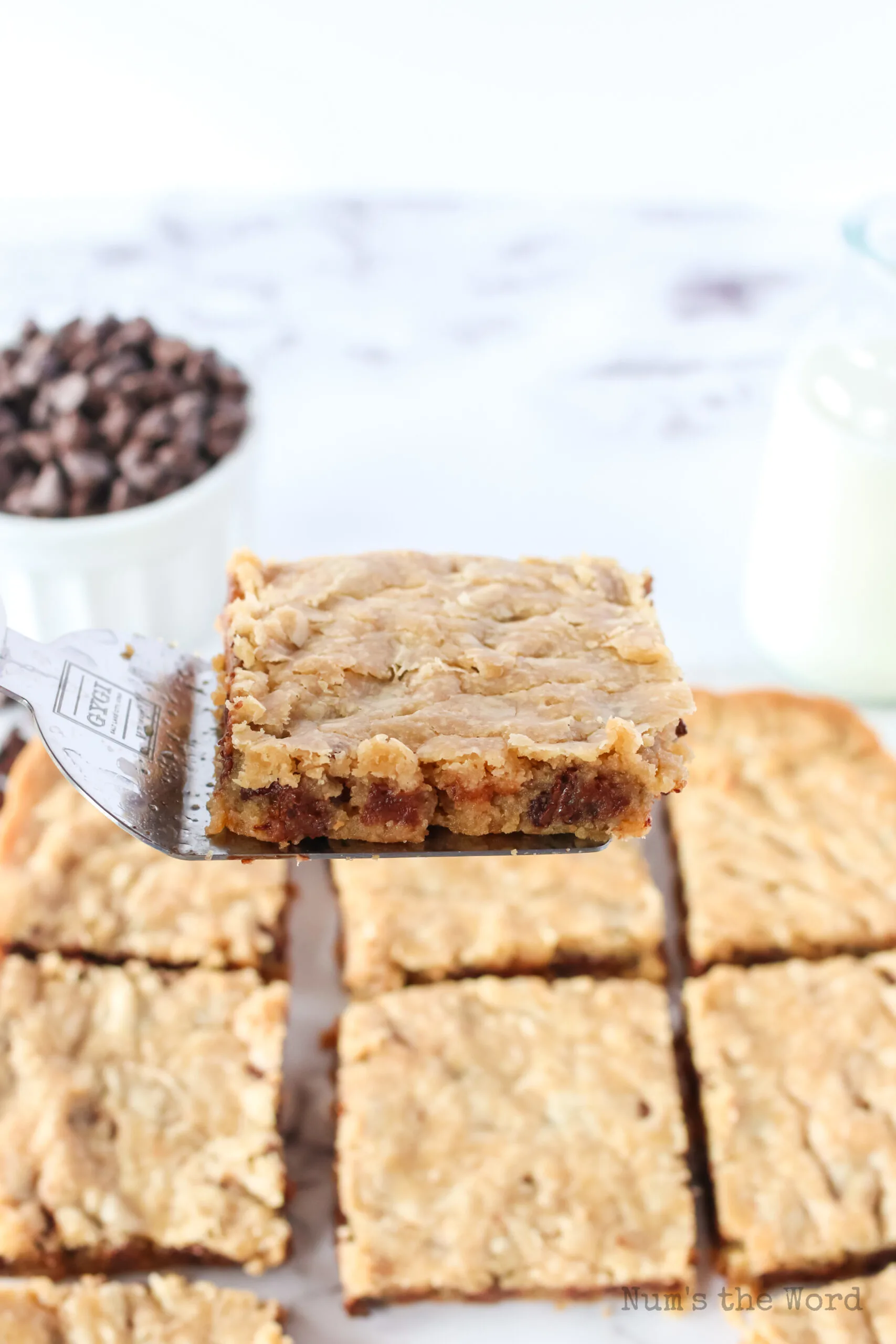 cookie bar scooped up with spatula.