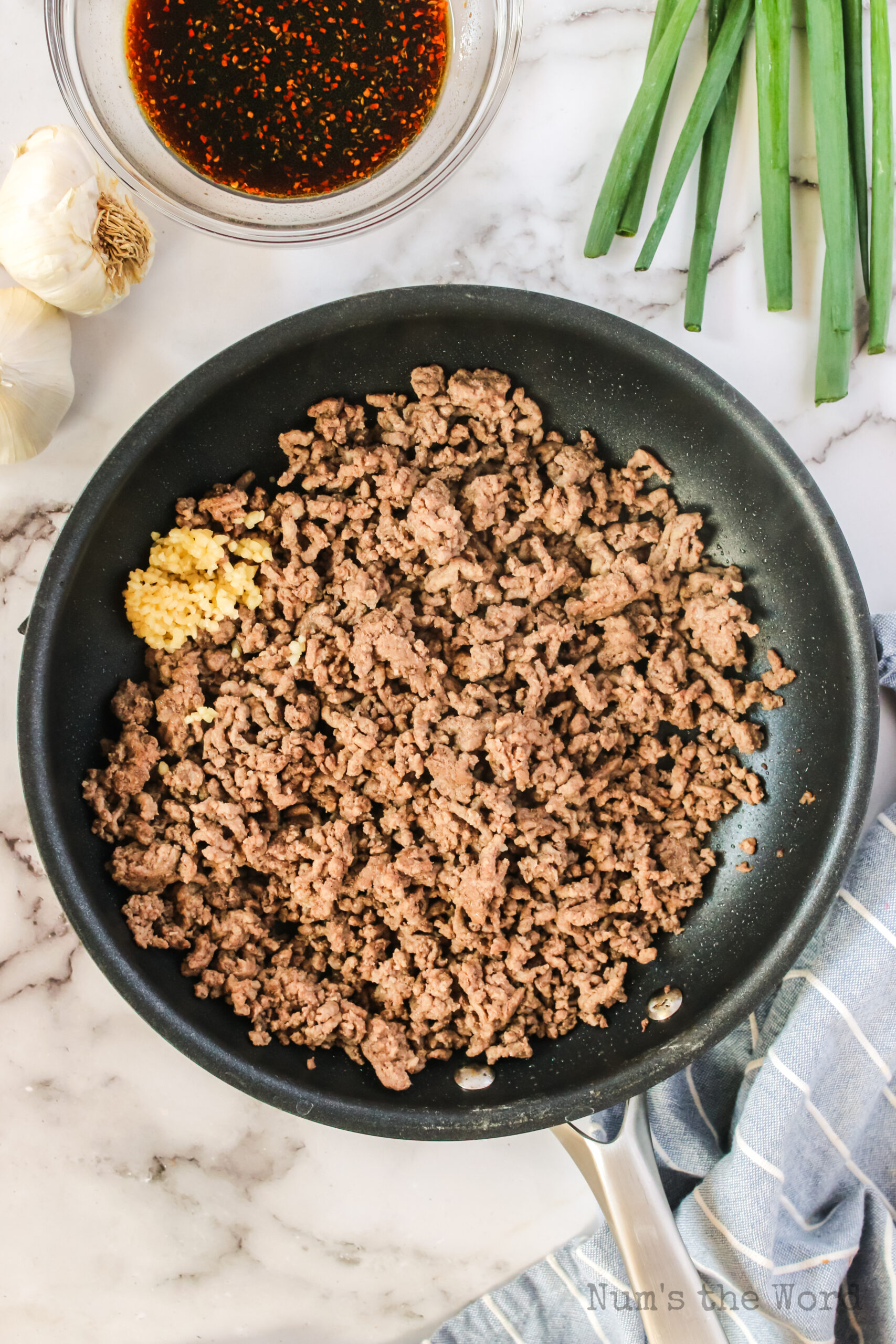 cooked ground beef with minced garlic