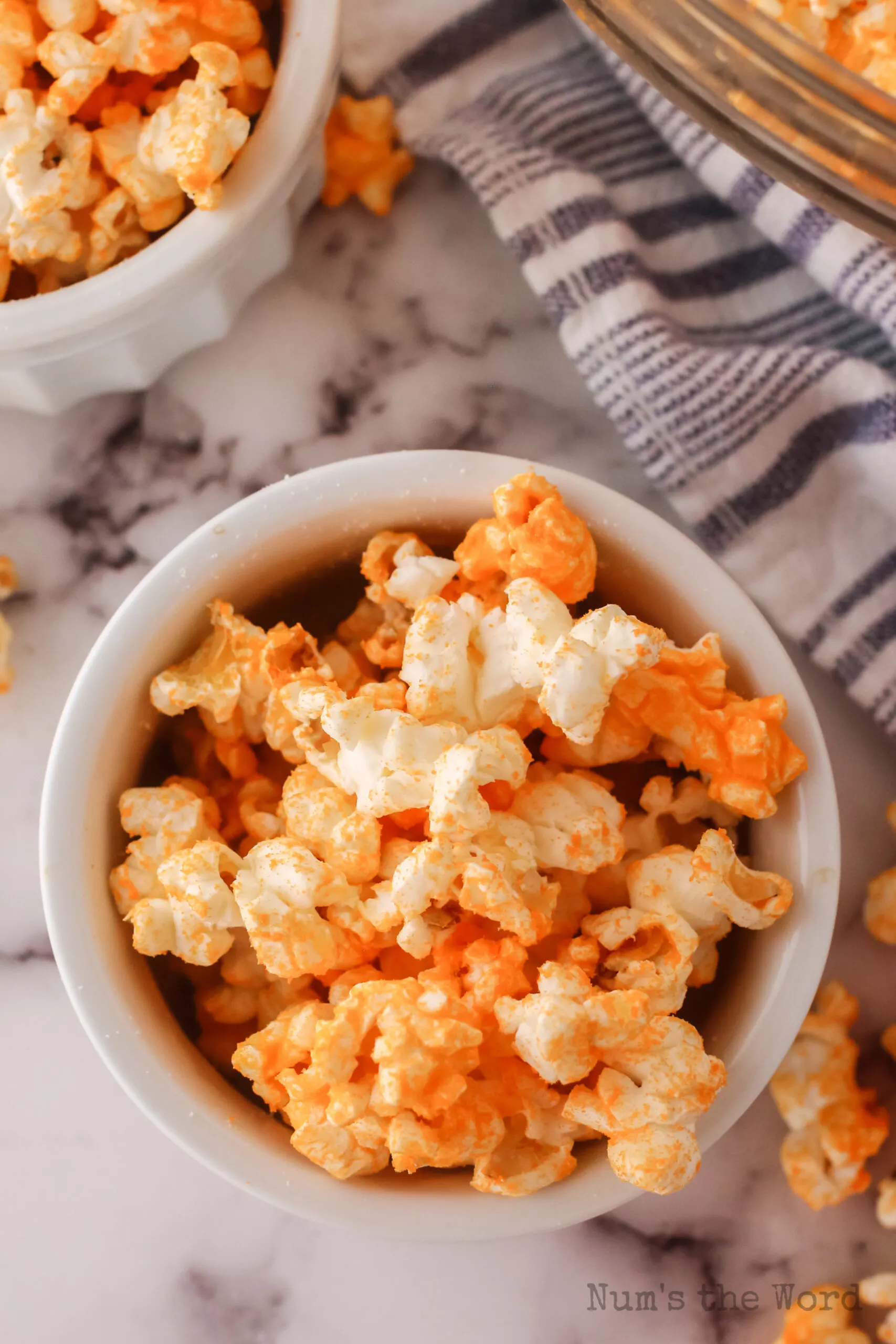 cheese popcorn in a small bowl ready to be eaten.