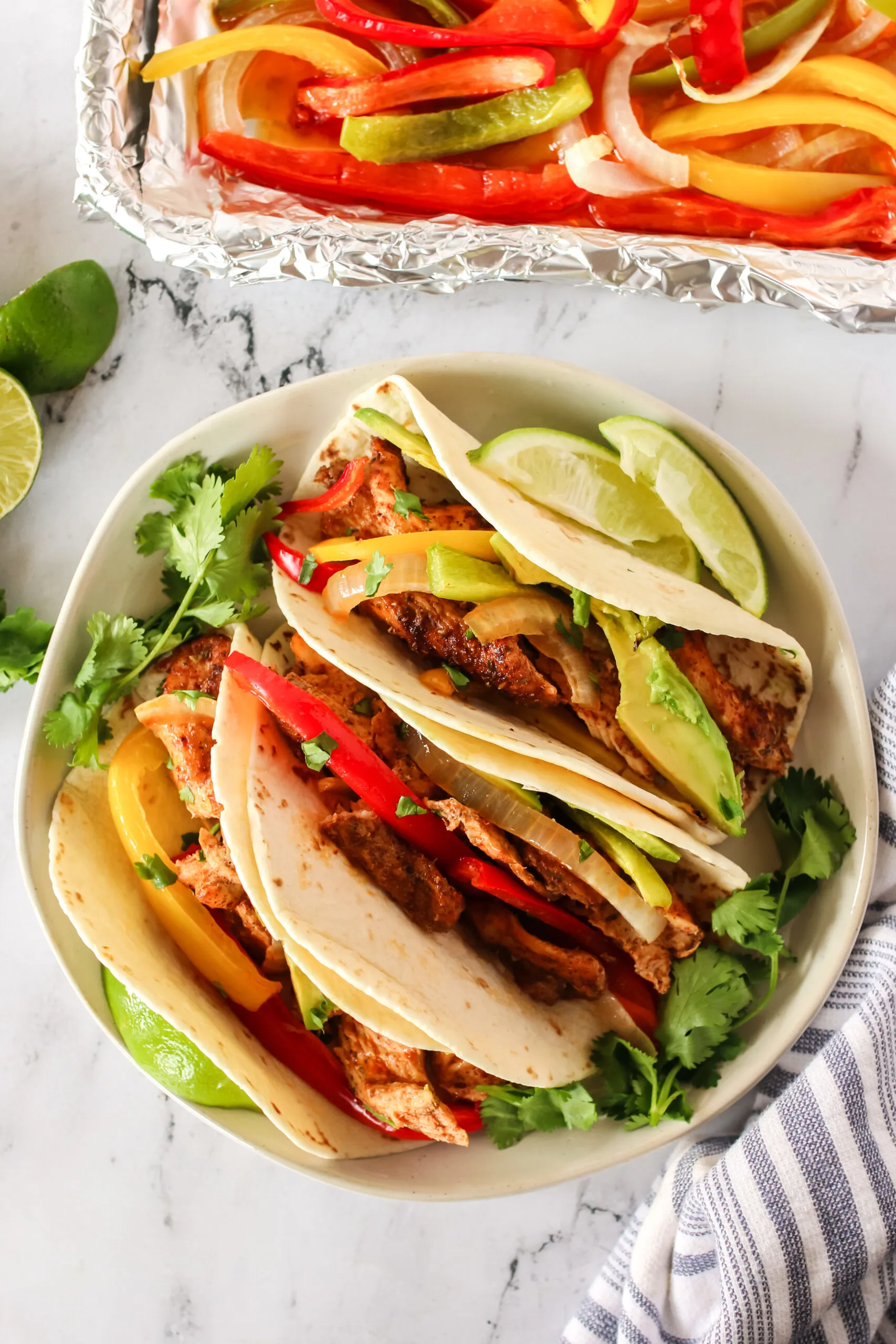 top view of 3 fajitas in tortillas