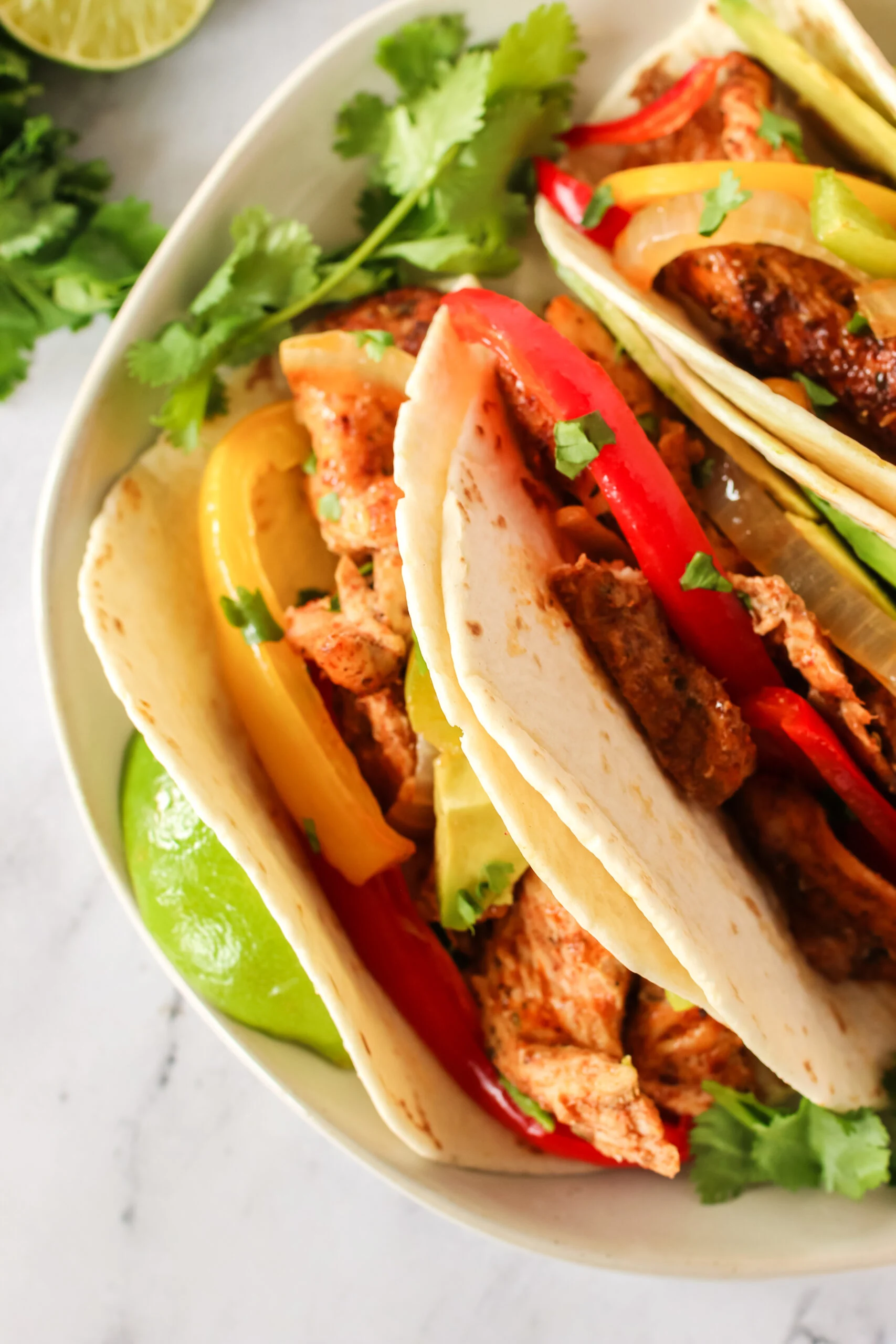 zoomed in fajita in flour tortillas