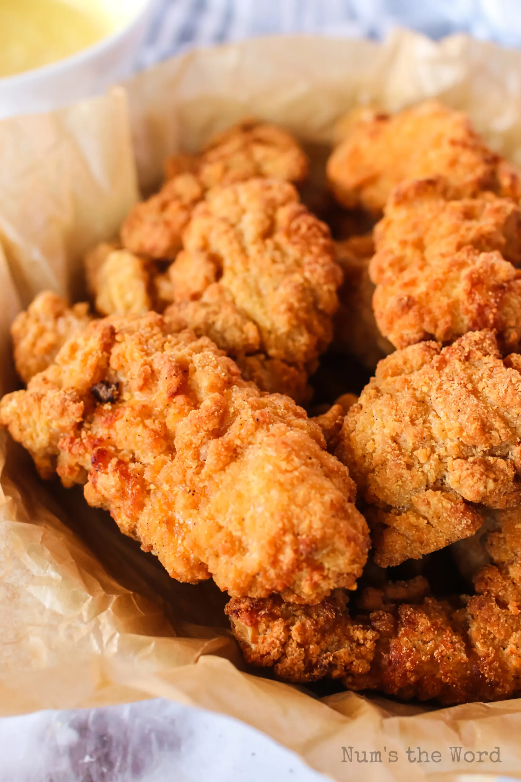 zoomed in image for chicken strips in basket