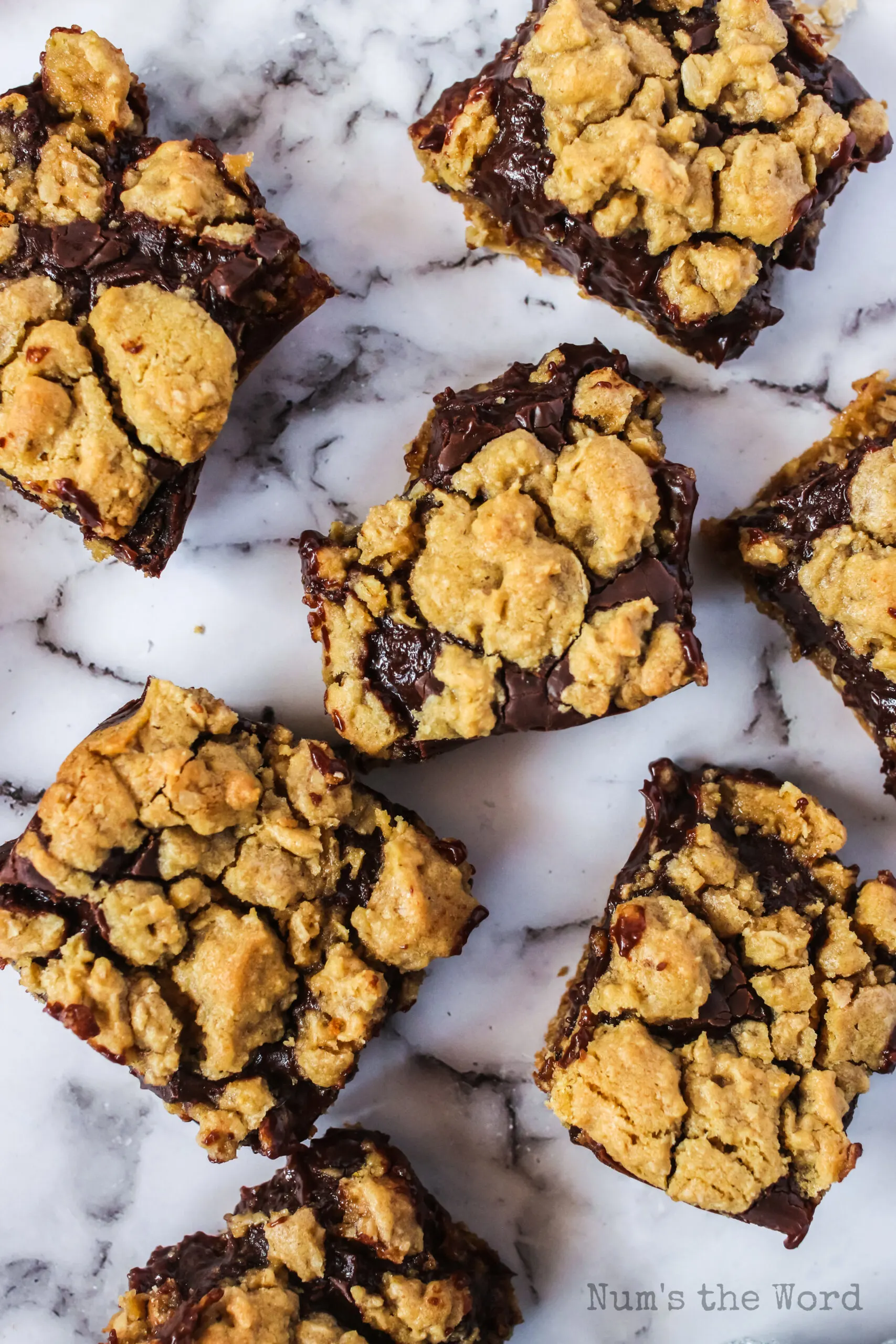 revel bars spread out on counter with a bite removed from each