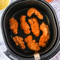 zoomed out image of strips in air fryer