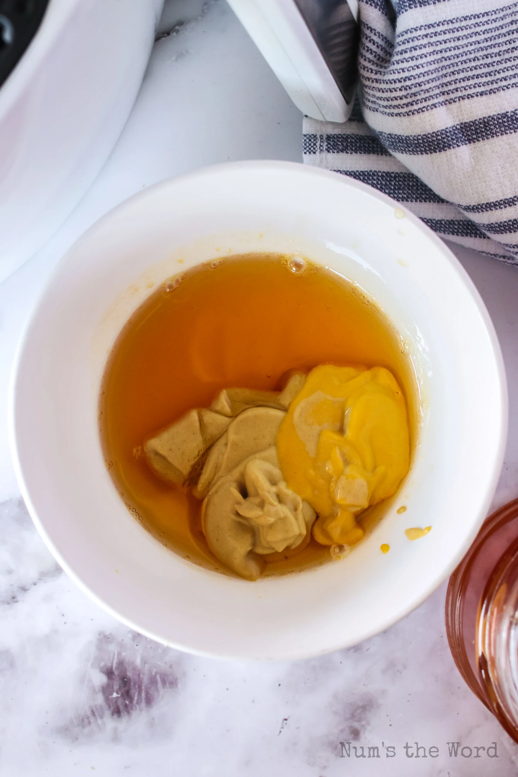 honey and mustard in a bowl for dressing