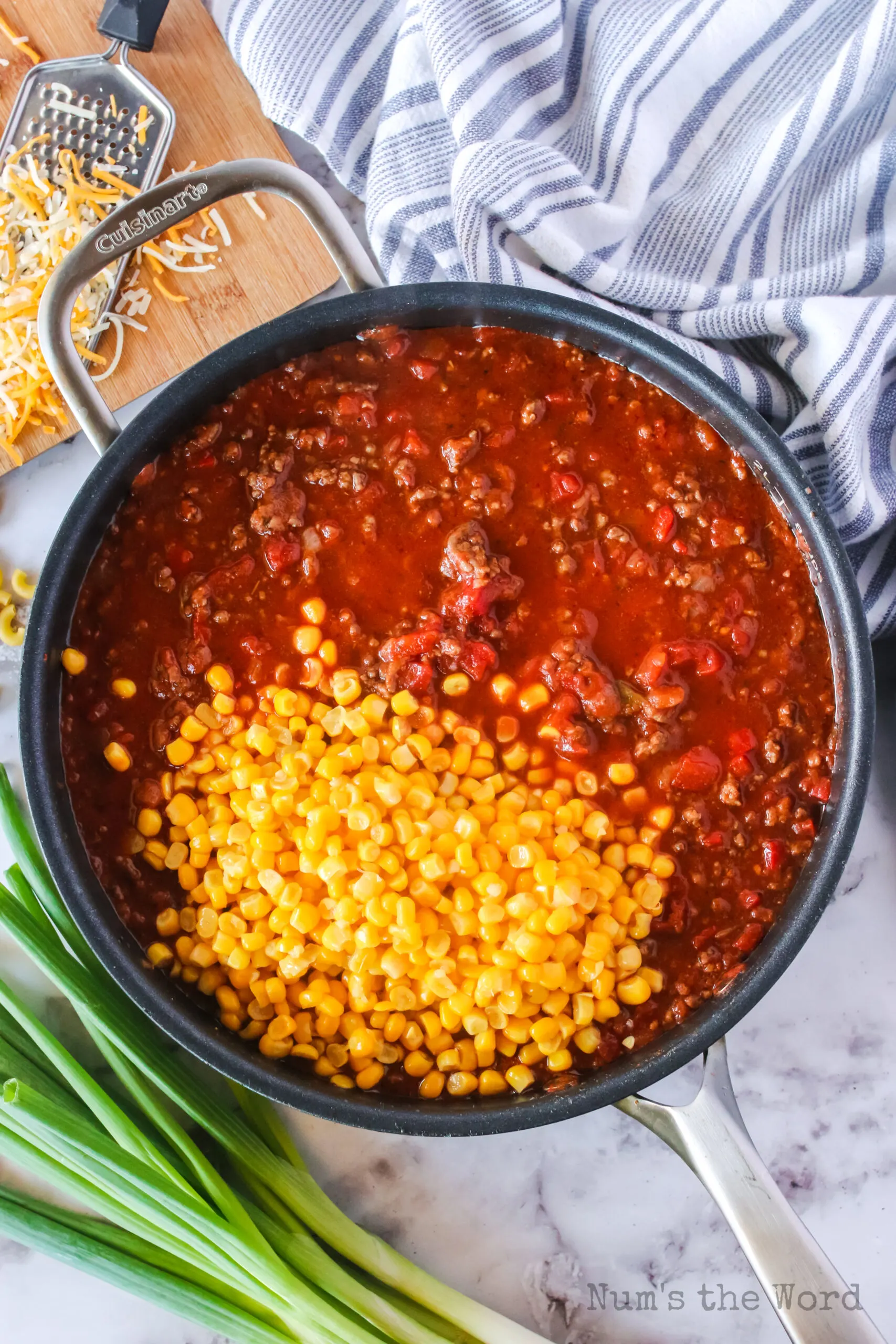 Corn added to beef mixture