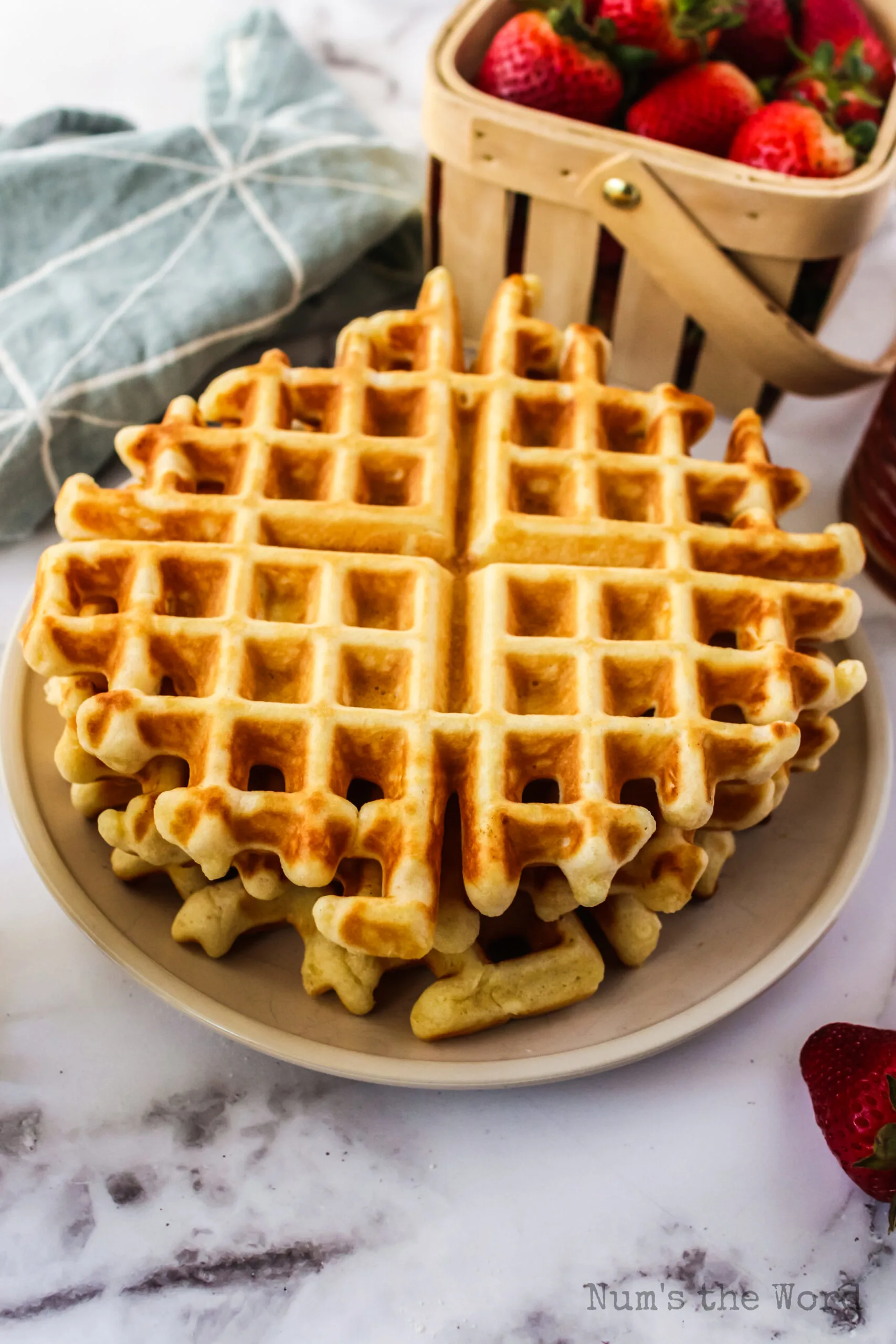 waffles stacked up, fresh out of the waffle iron