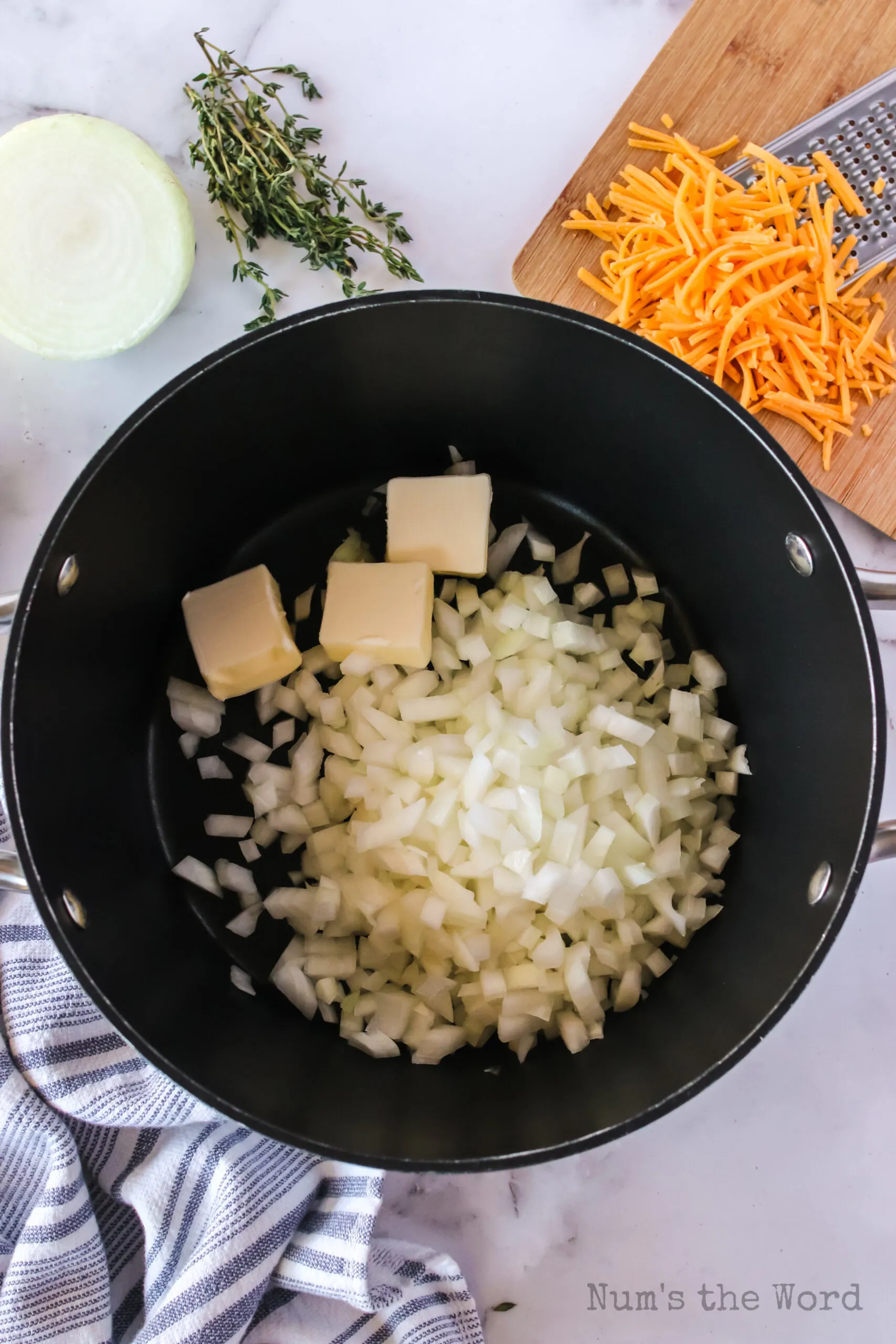 butter and onion in a pot, ready to be cooked