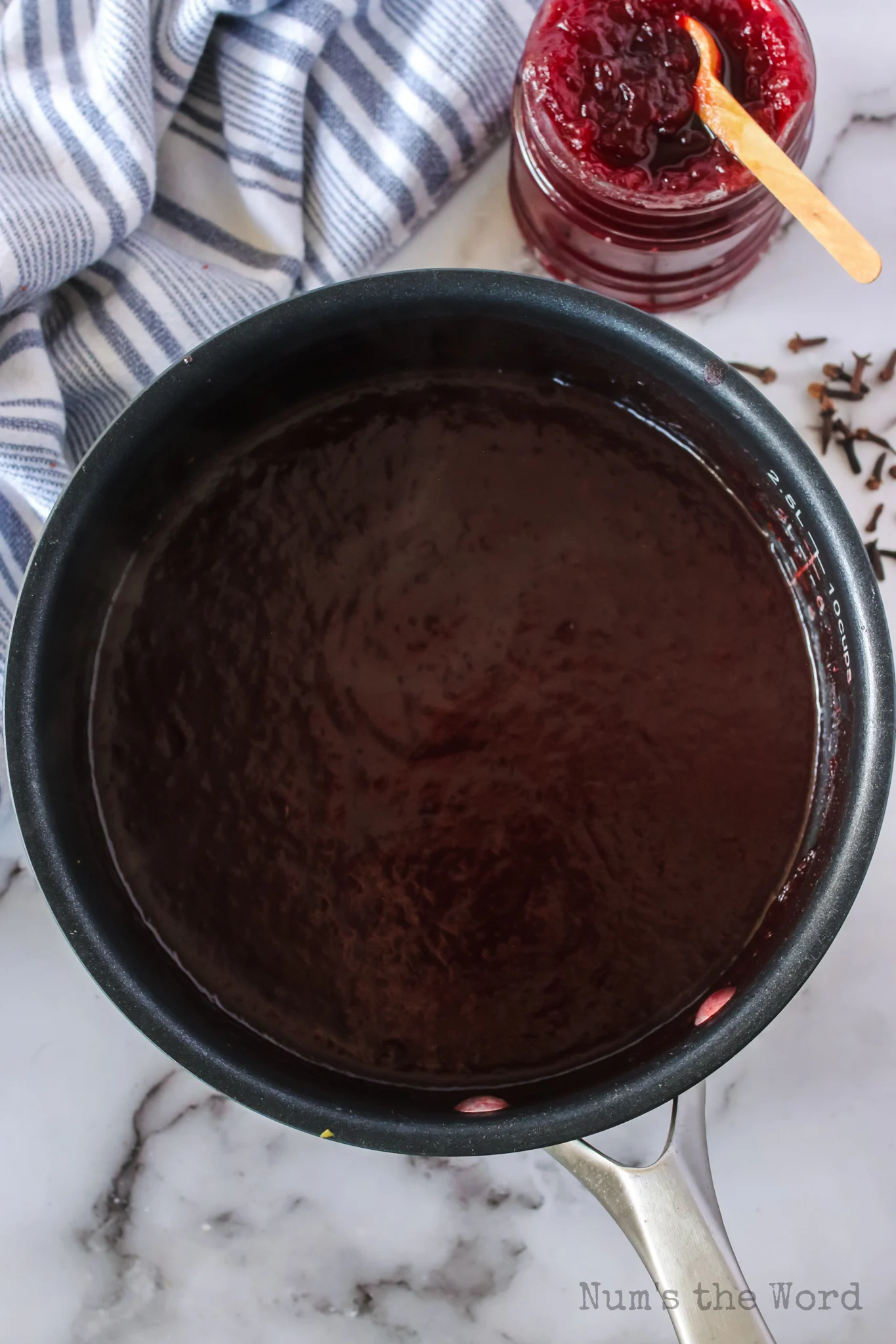 cranberry sauce, brown sugar and broth in a pot