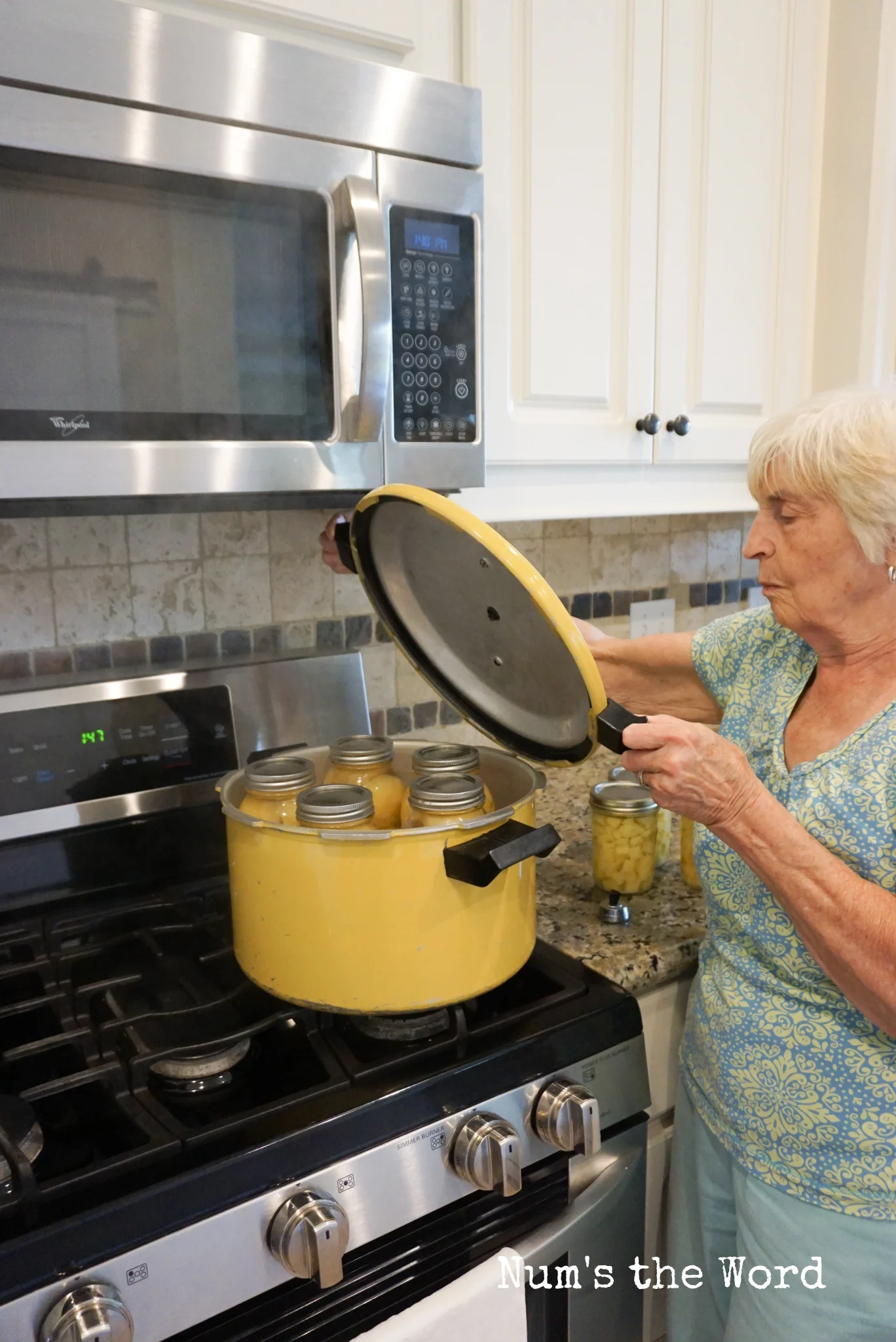 showing how to open canner away from your face