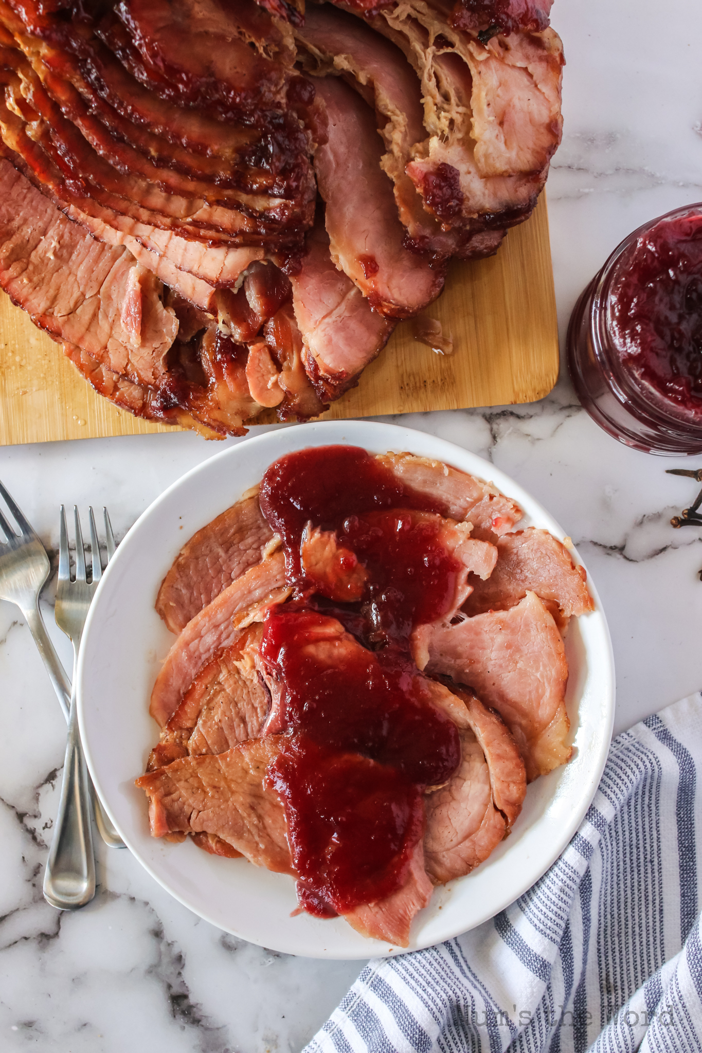 zoomed out image of sliced ham with glaze