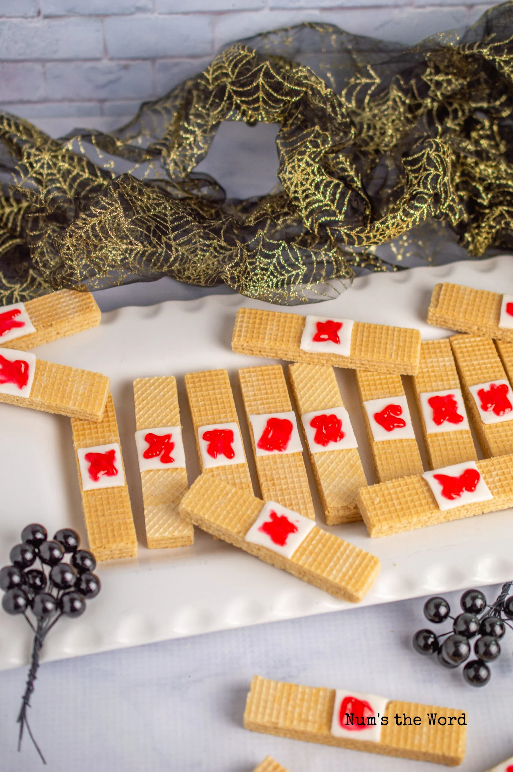 zoomed out image of cookies on platter with ribbon