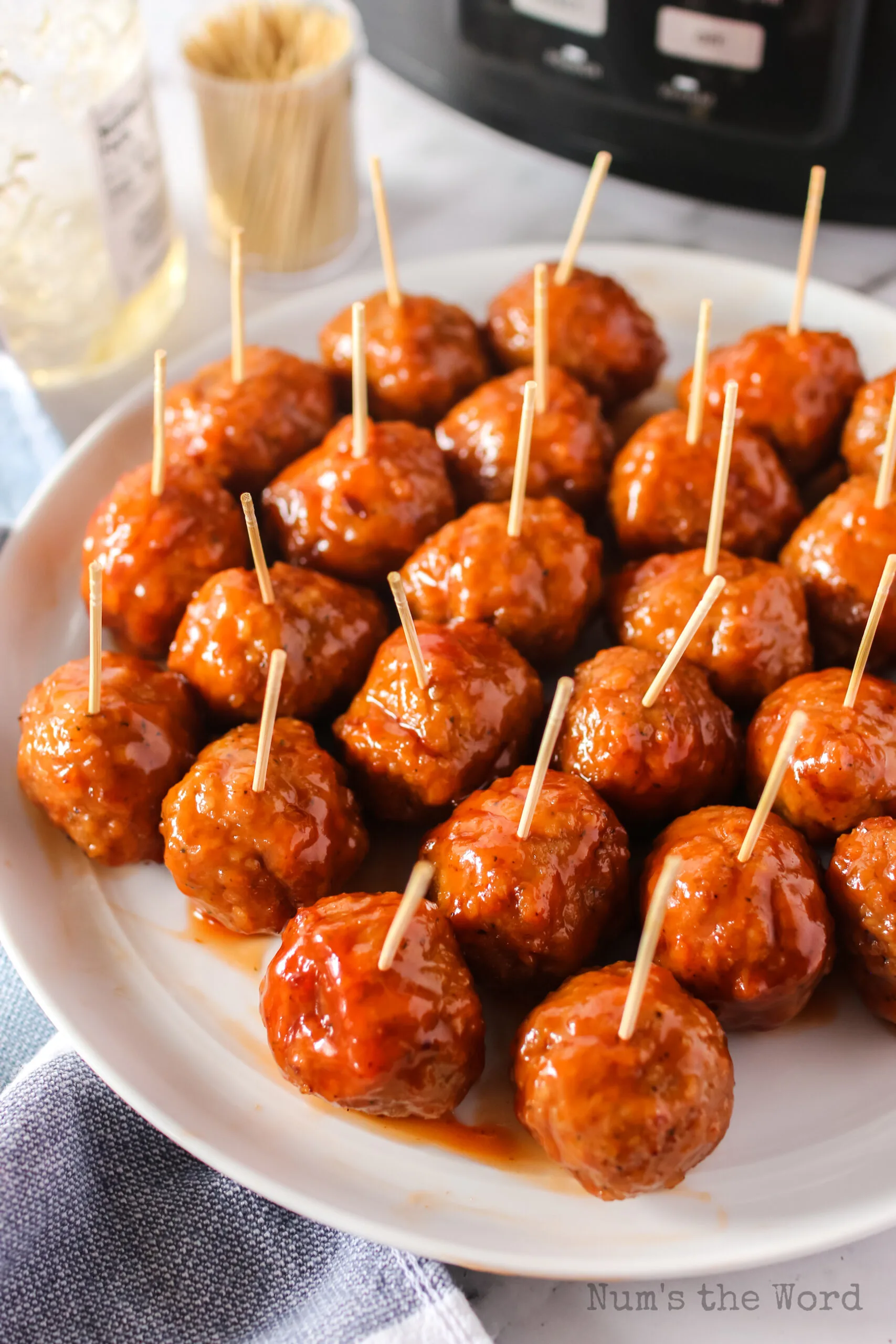 top side view of meatballs on platter with toothpicks