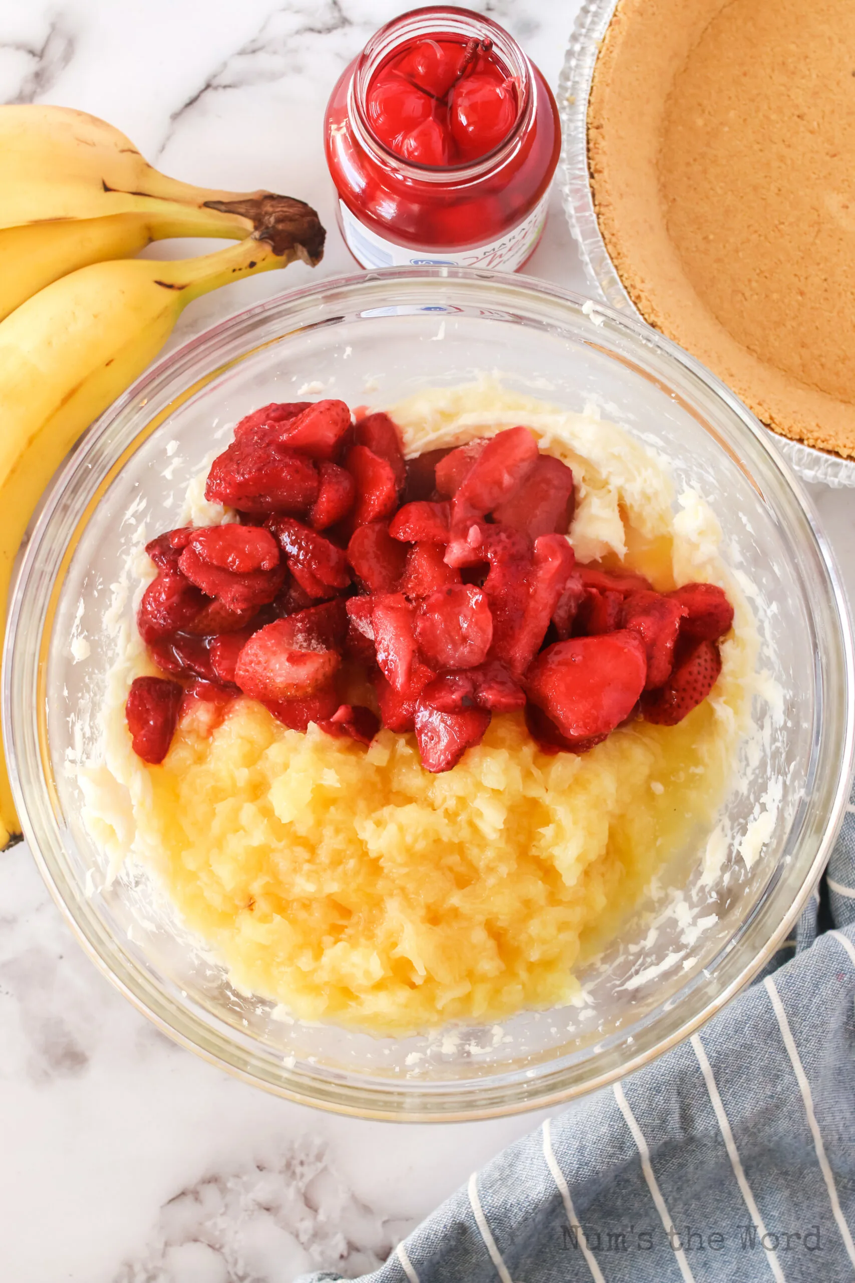 drained pinapple and frozen strawberries added to cream cheese mixture.