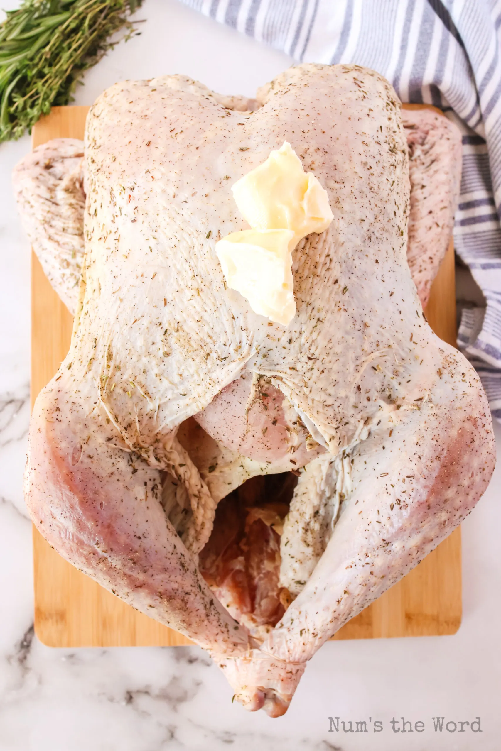 butter rubbed all over dry brined turkey