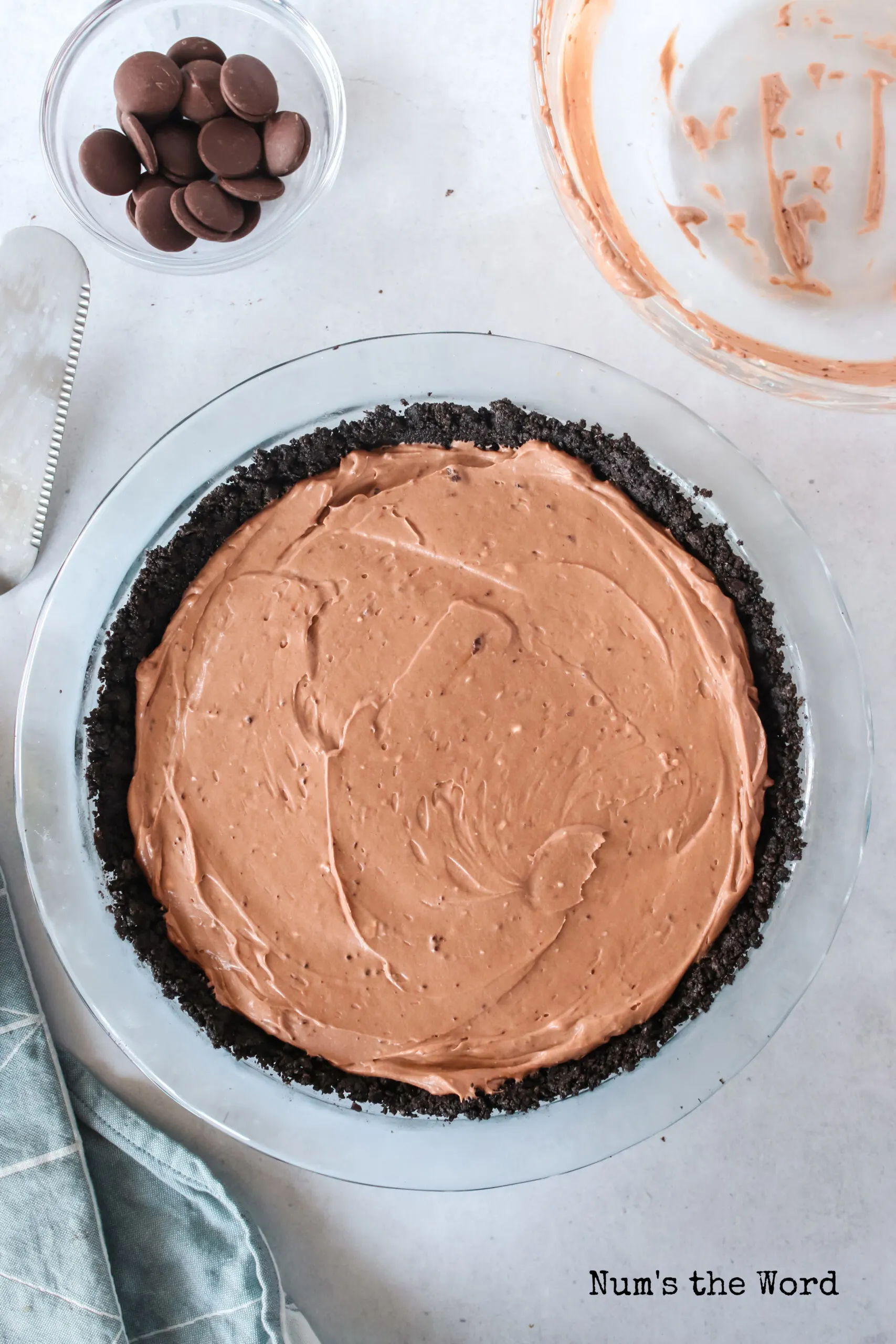 chocolate cheesecake mixture in an oreo pie crust