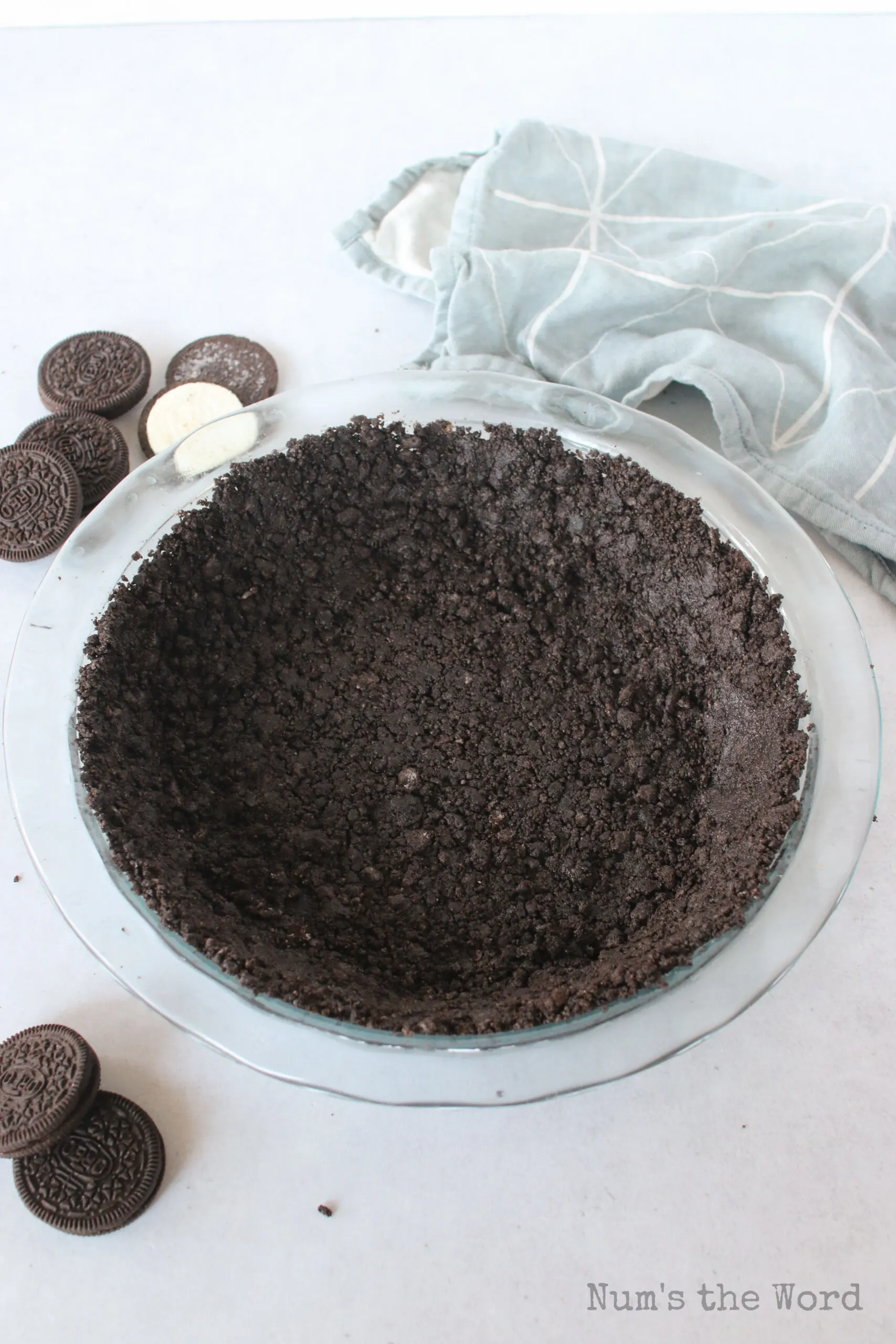 top side view of chocolate cookie crust in a dish