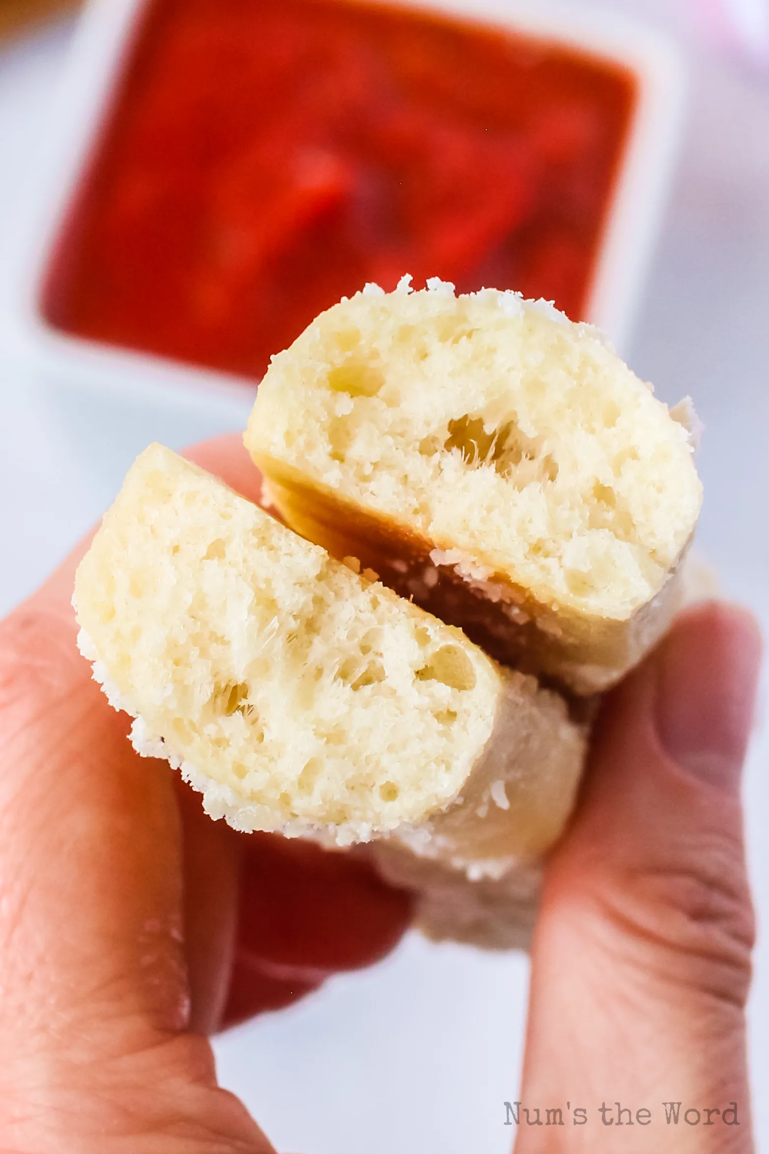 bread stick cut in half to show how fluffy it is