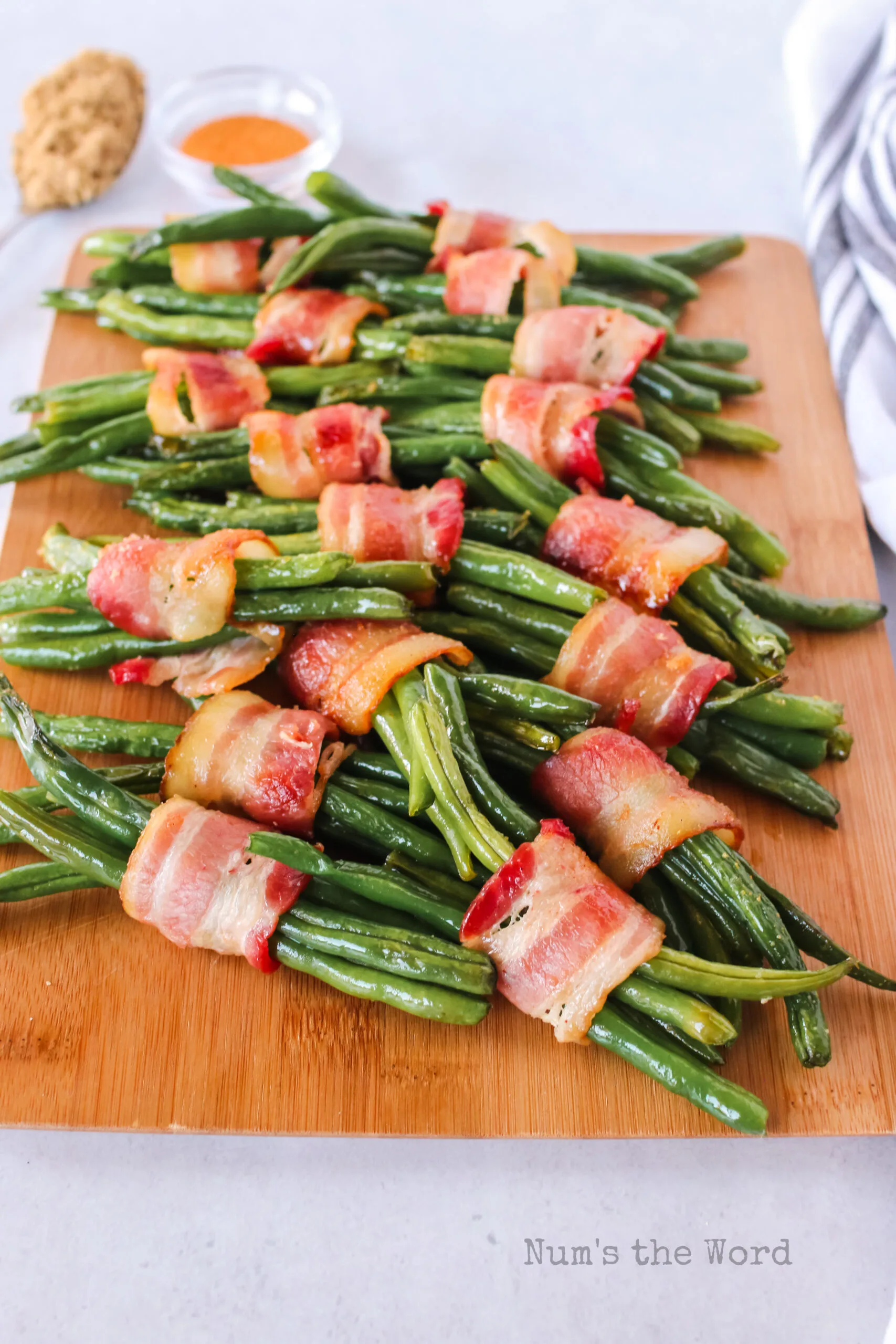 zoomed out side view of bundles on a serving board