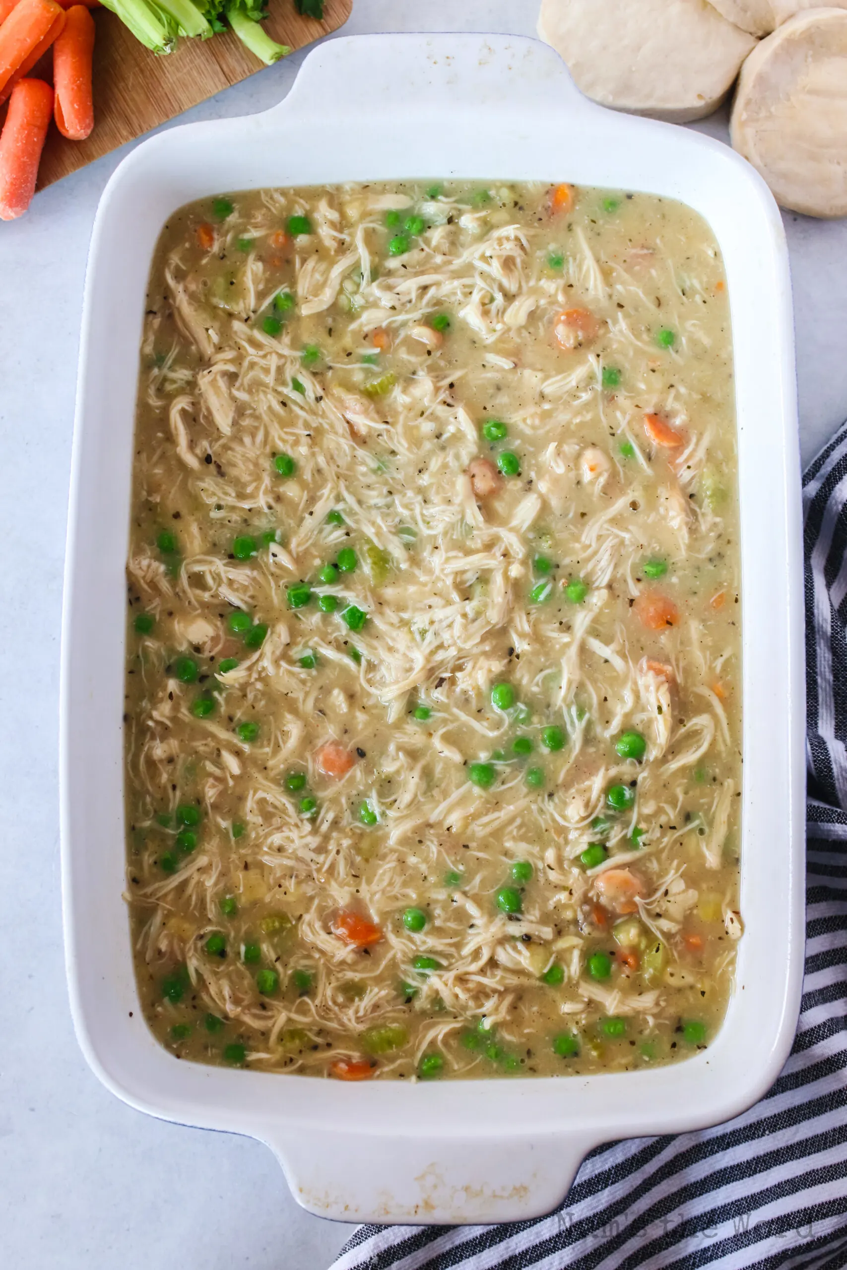 chicken and gravy mixture in casserole dish, unbaked