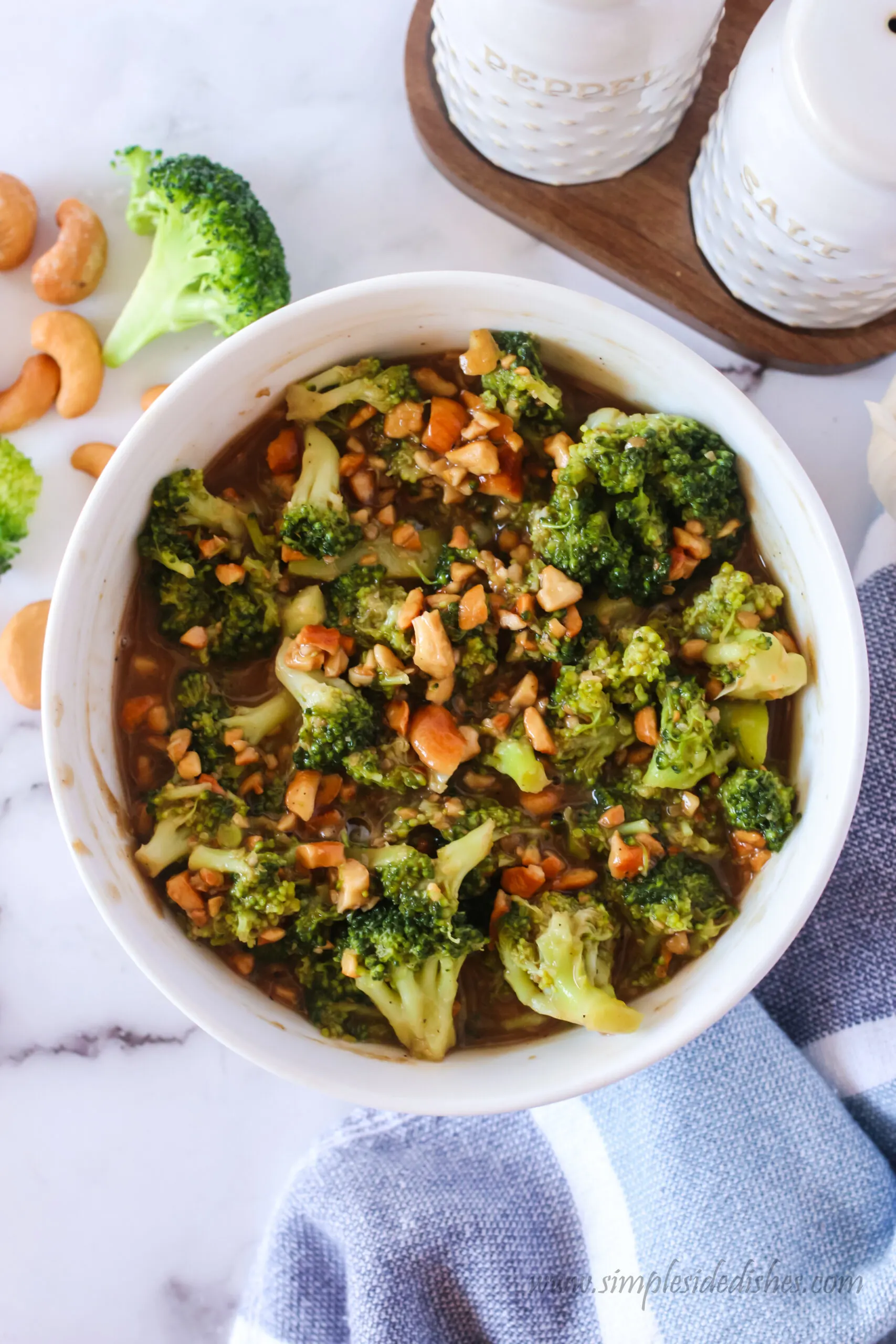 top view looking down of broccoli cashew salad in a bowl