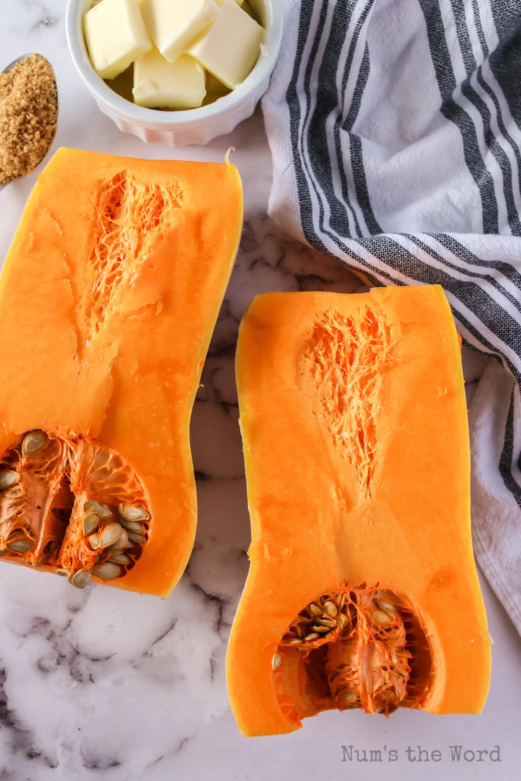 top and bottom cut off butternut squash and then cut in half