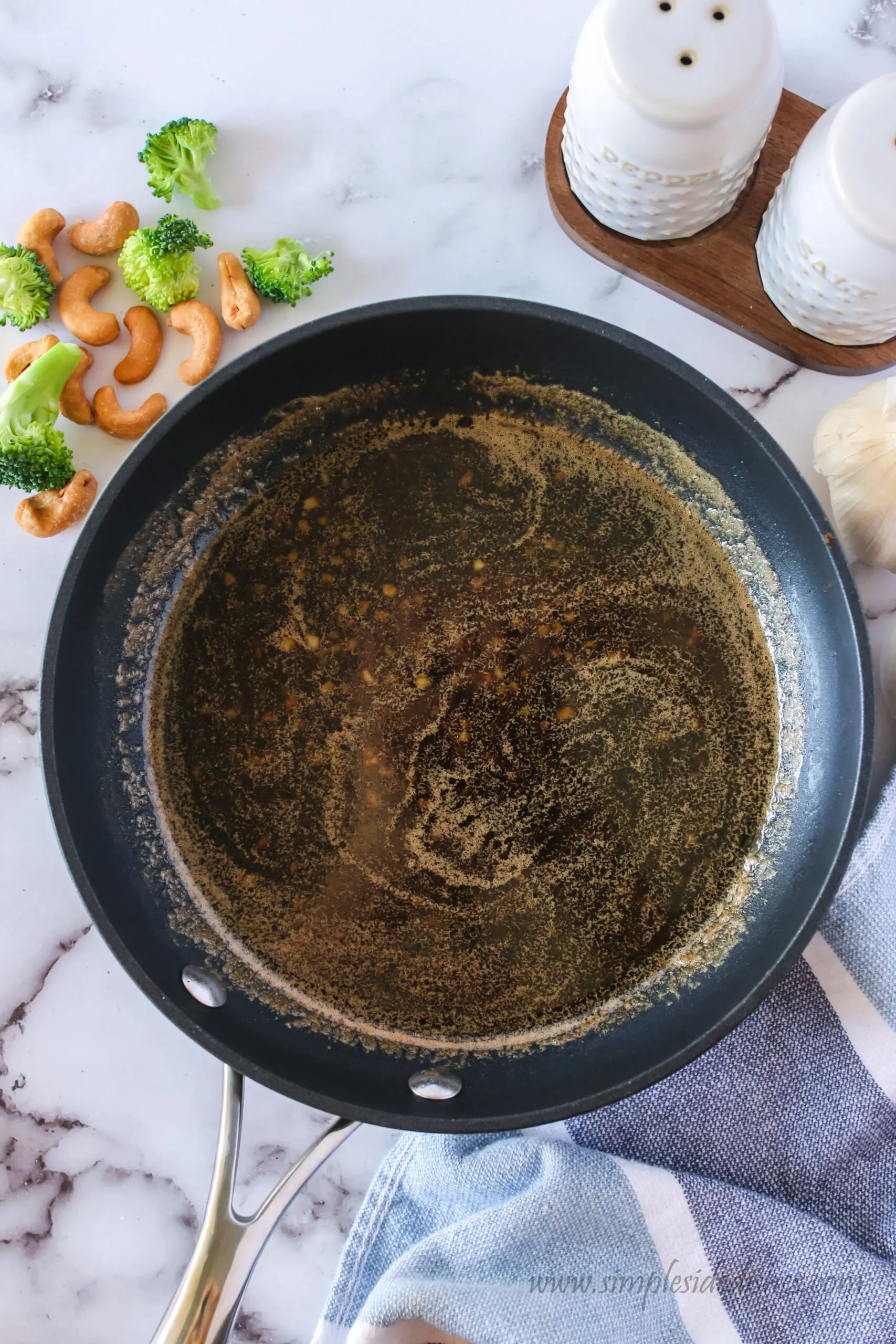 brown sugar, soy sauce, vinegar and pepper added to garlic mixture