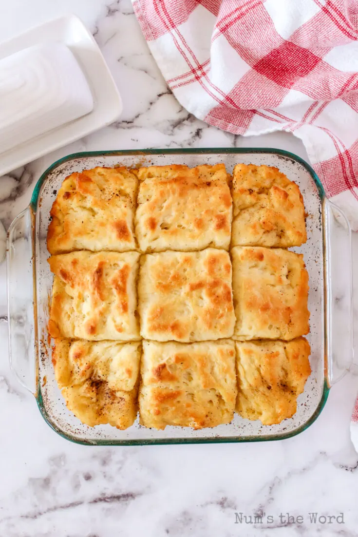 baked biscuit dough cut into 9 sections and ready to eat